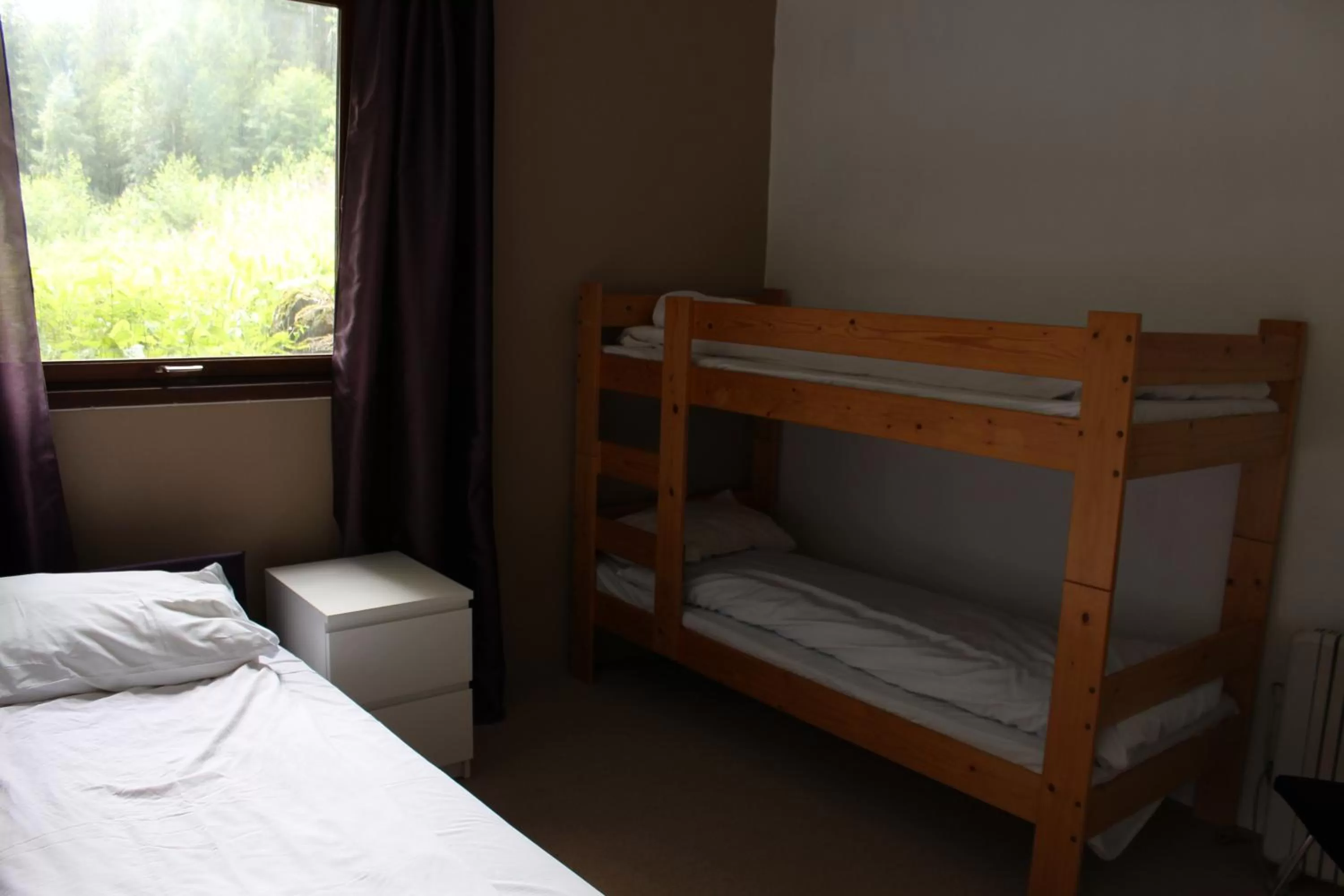 Bed in Smedsgården Hotel