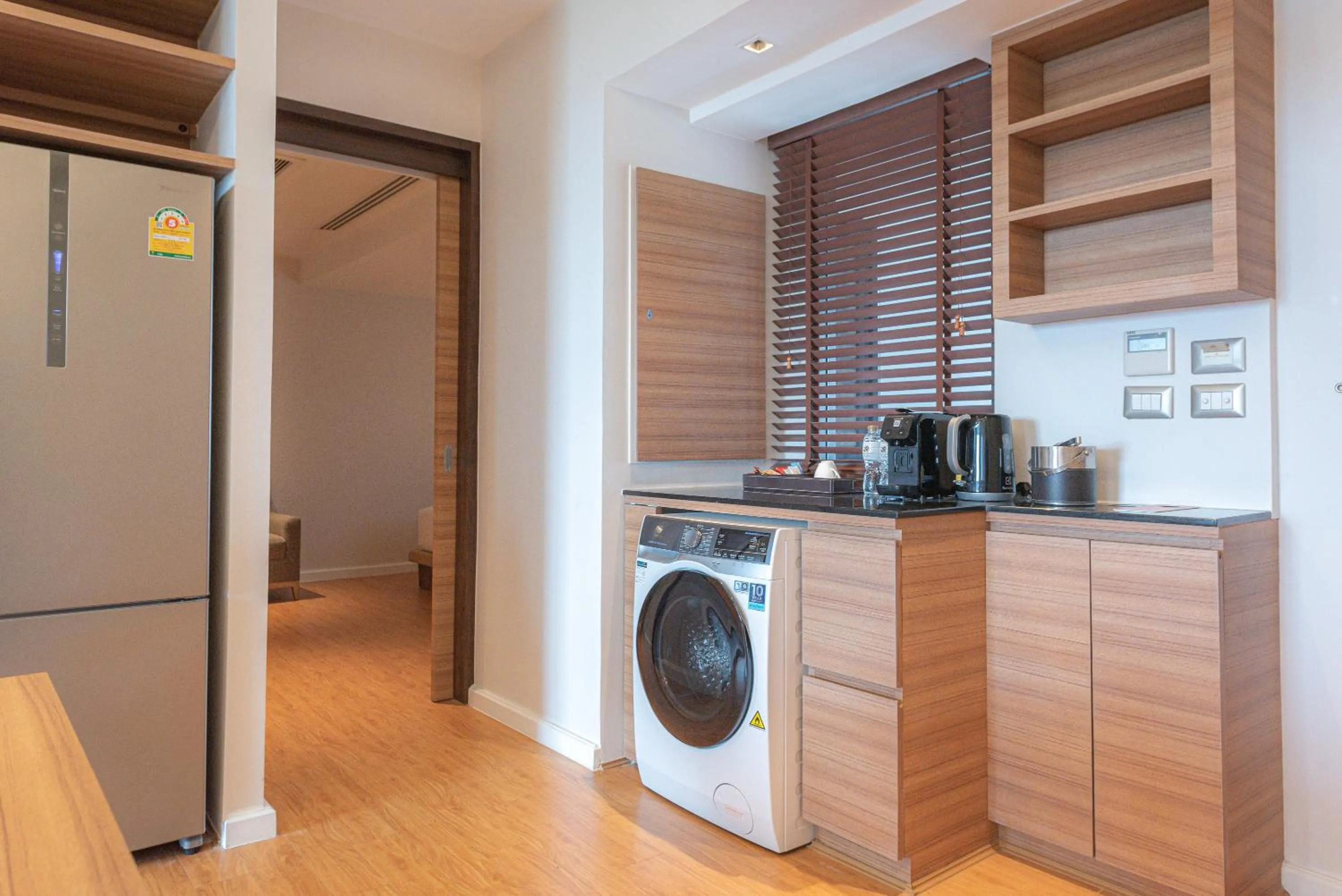 kitchen in Summit Windmill Golf Suite Hotel at Suvarnabhumi