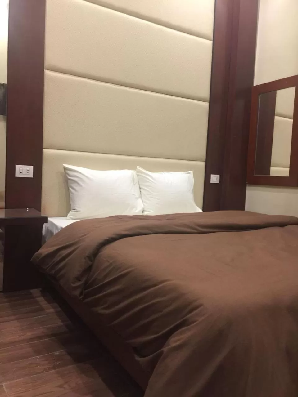 Bed in Grand Palace Hotel