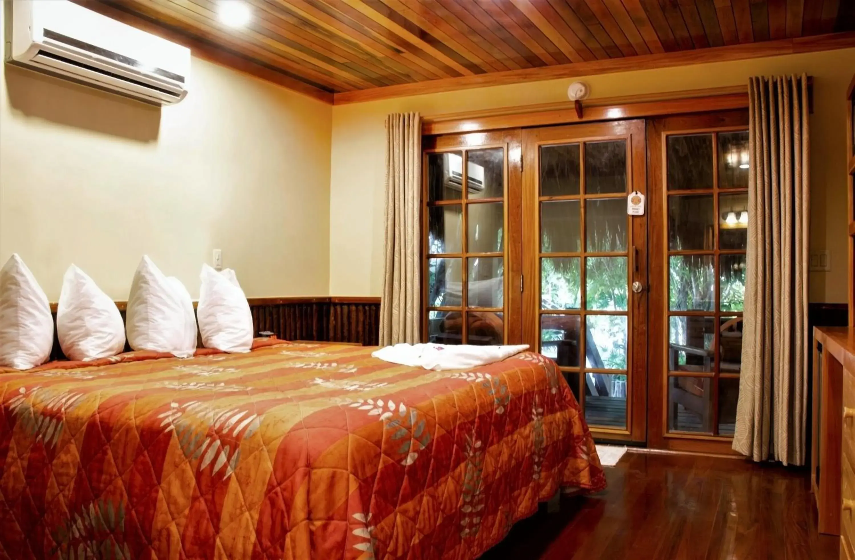 Bed in Ramon's Village Resort