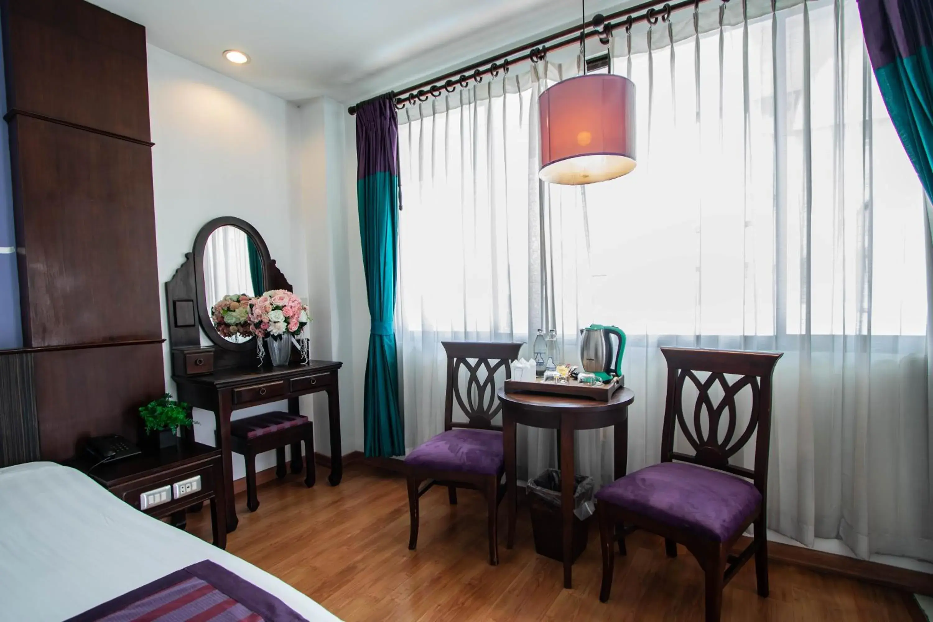 Seating area, TV/Entertainment Center in Eurana Boutique Hotel