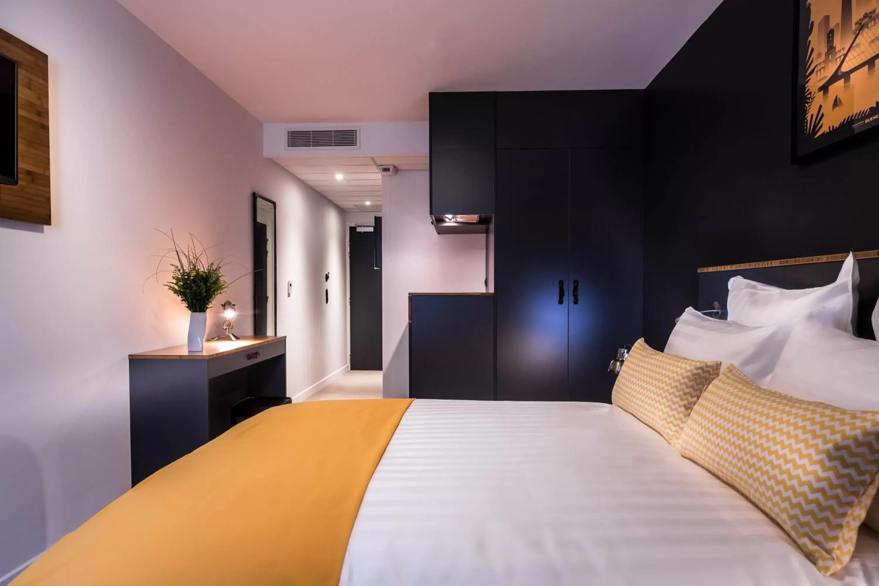 Bedroom, Bed in Best Western Plus Suitcase Paris La Défense