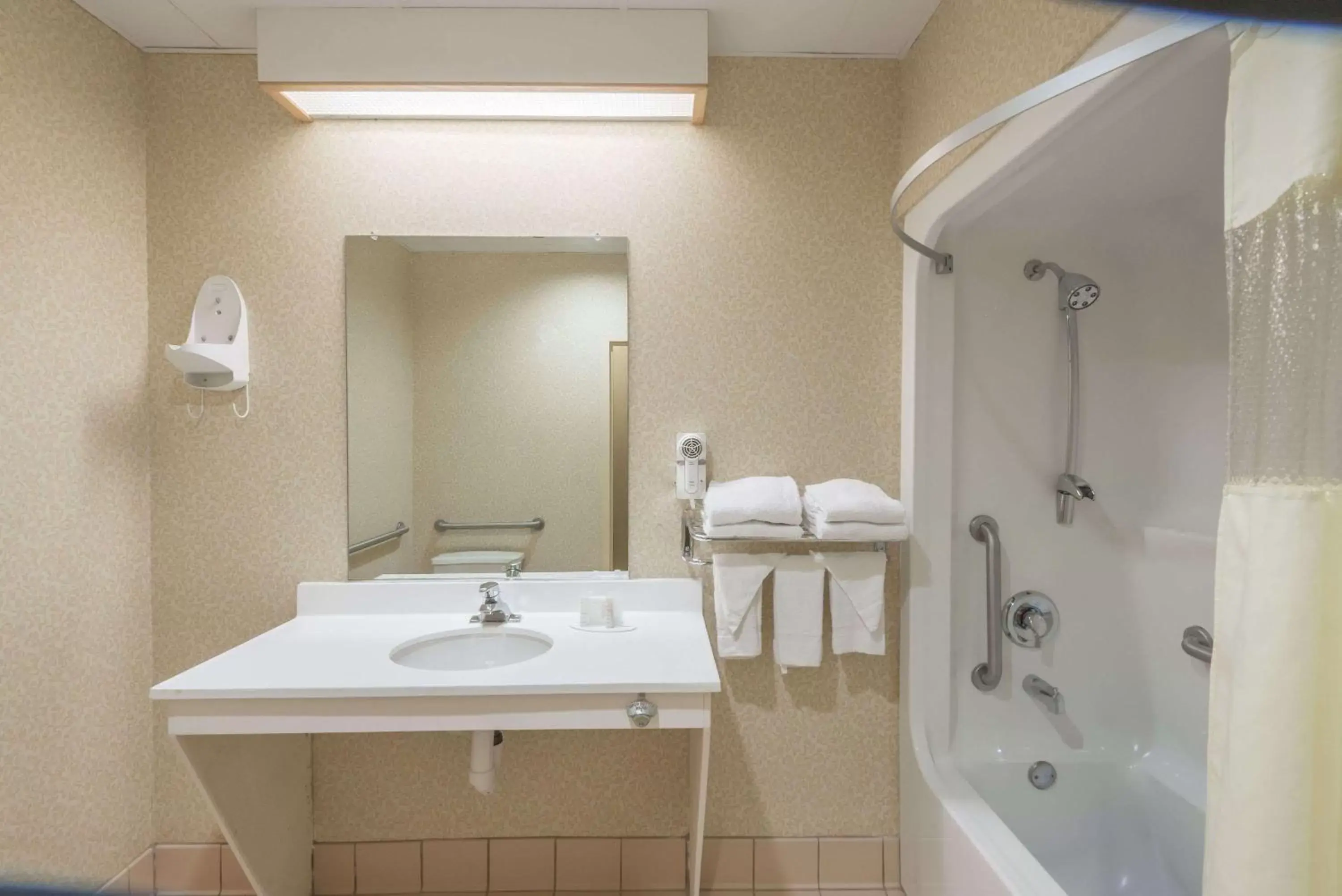 Photo of the whole room, Bathroom in Manchester Inn & Suites