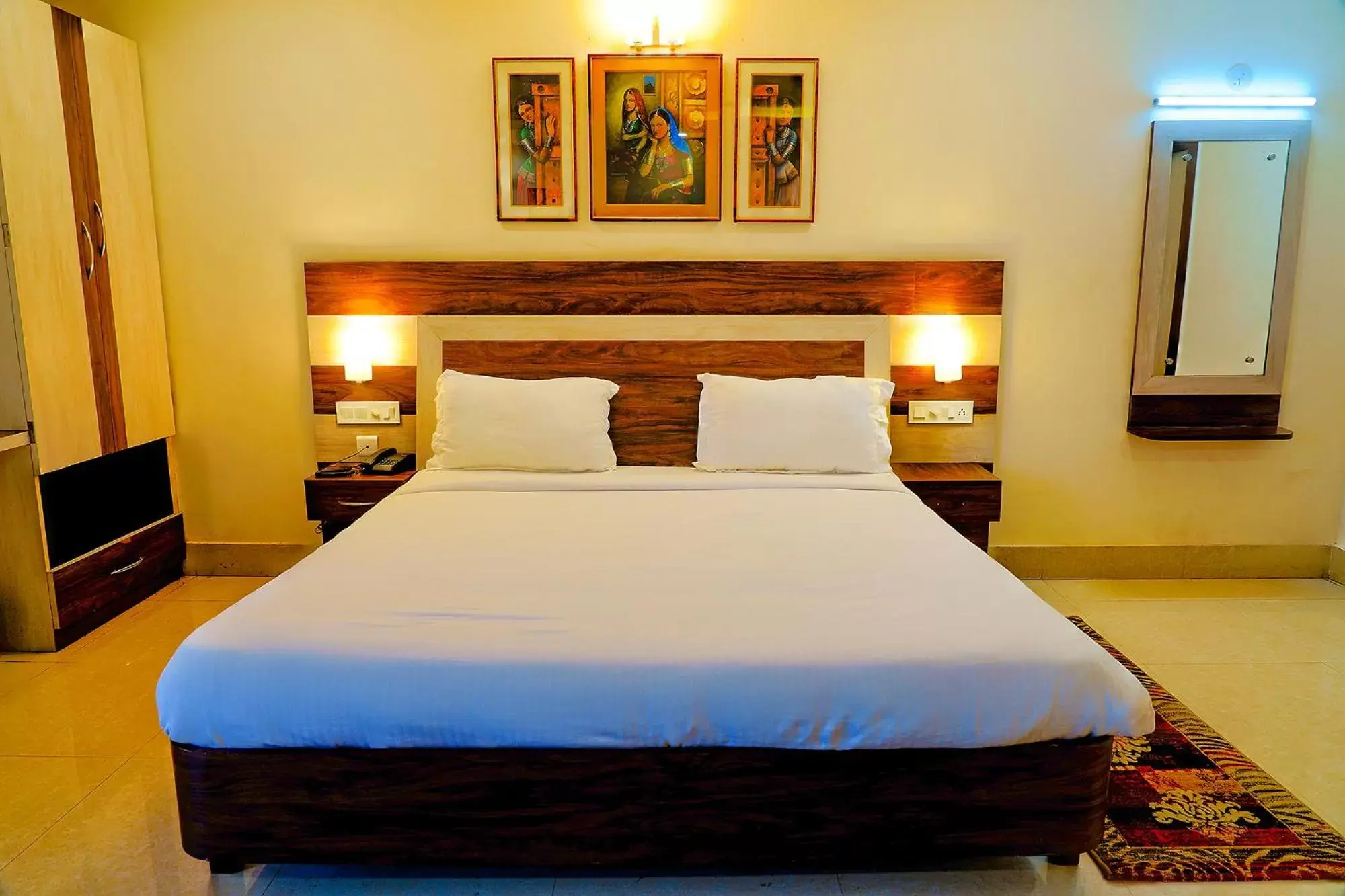 Bed in FabHotel Kanchan Plaza