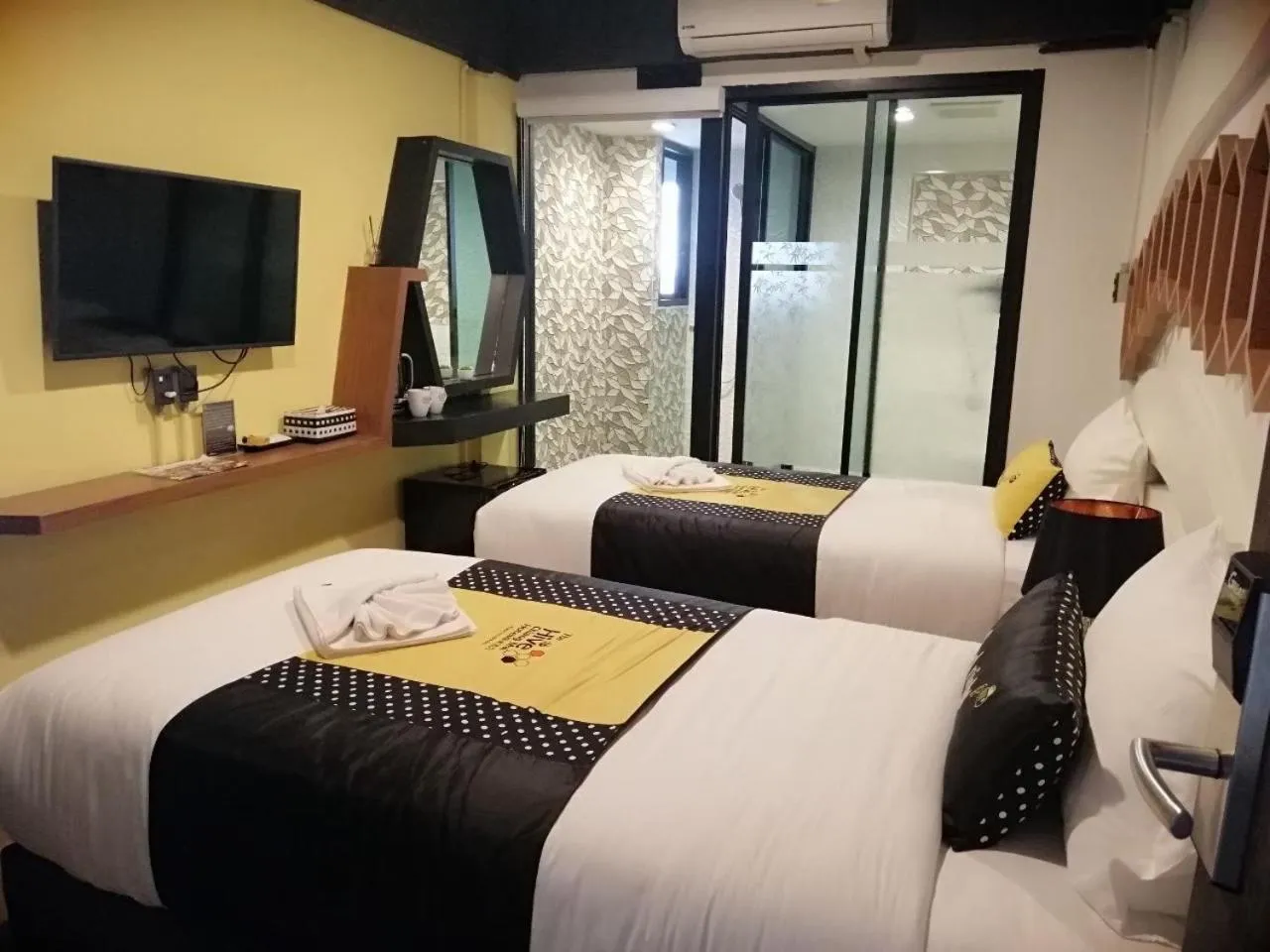 Bed in The Hive Chiang Mai Hotel