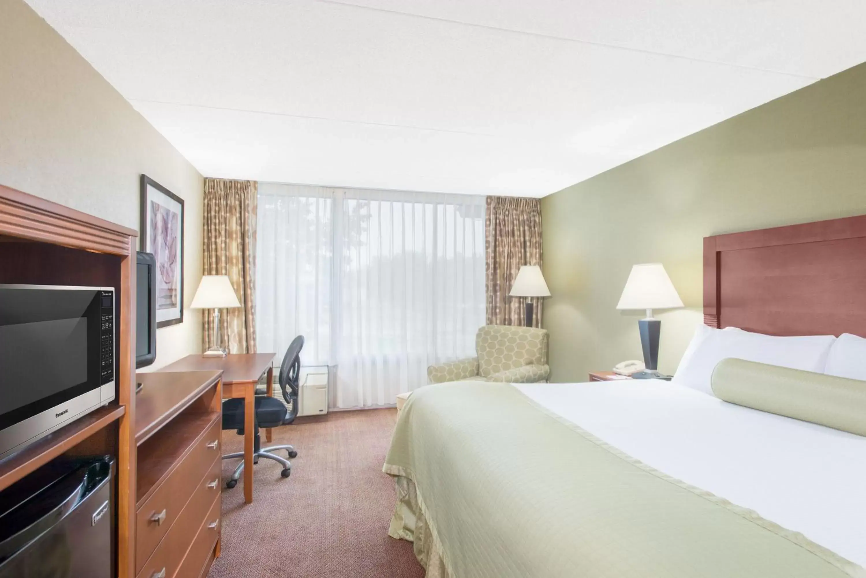 Photo of the whole room, Bed in Ramada by Wyndham Ellsworth - Bar Harbor