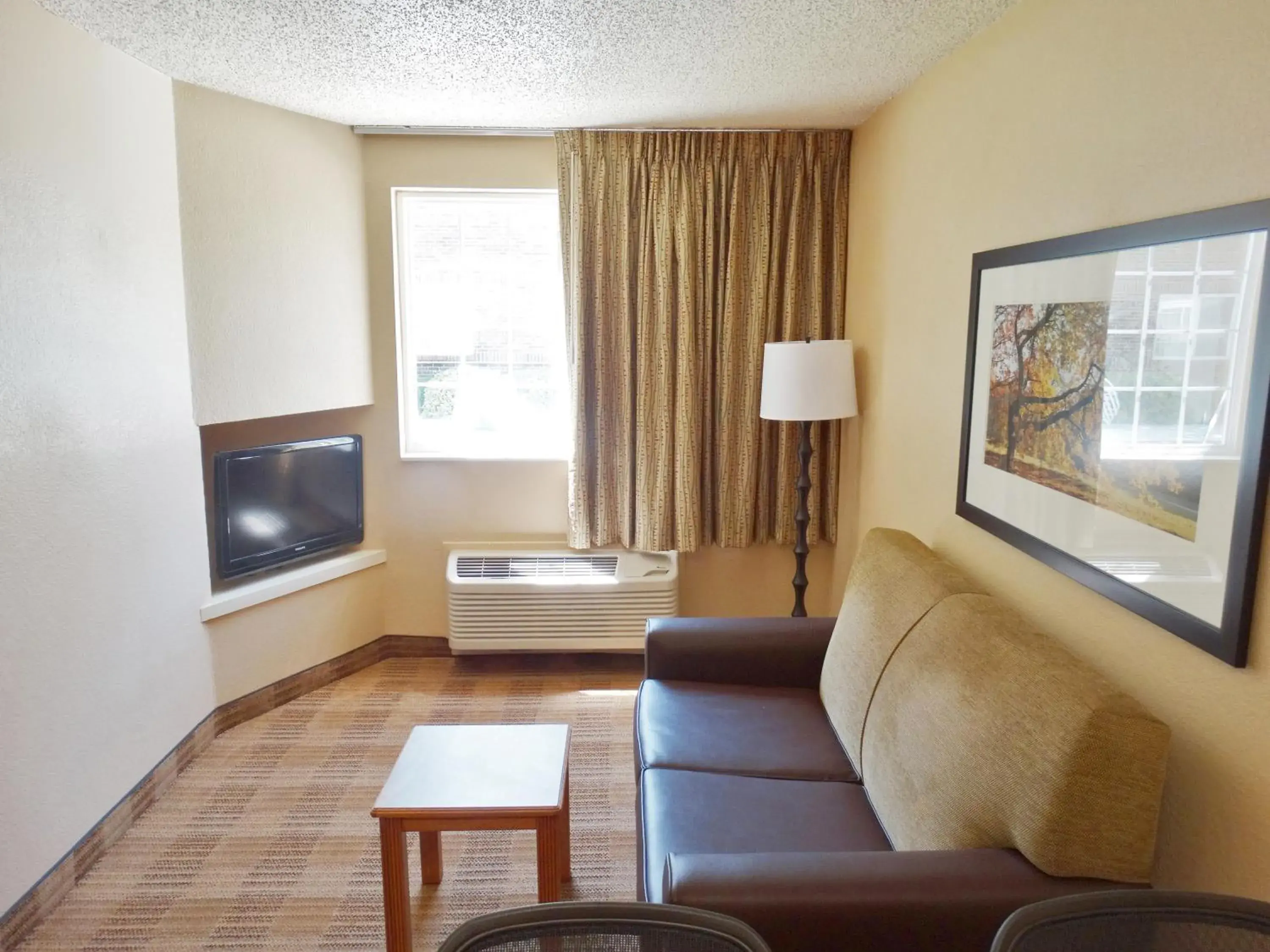 TV and multimedia, Seating Area in MainStay Suites Raleigh North