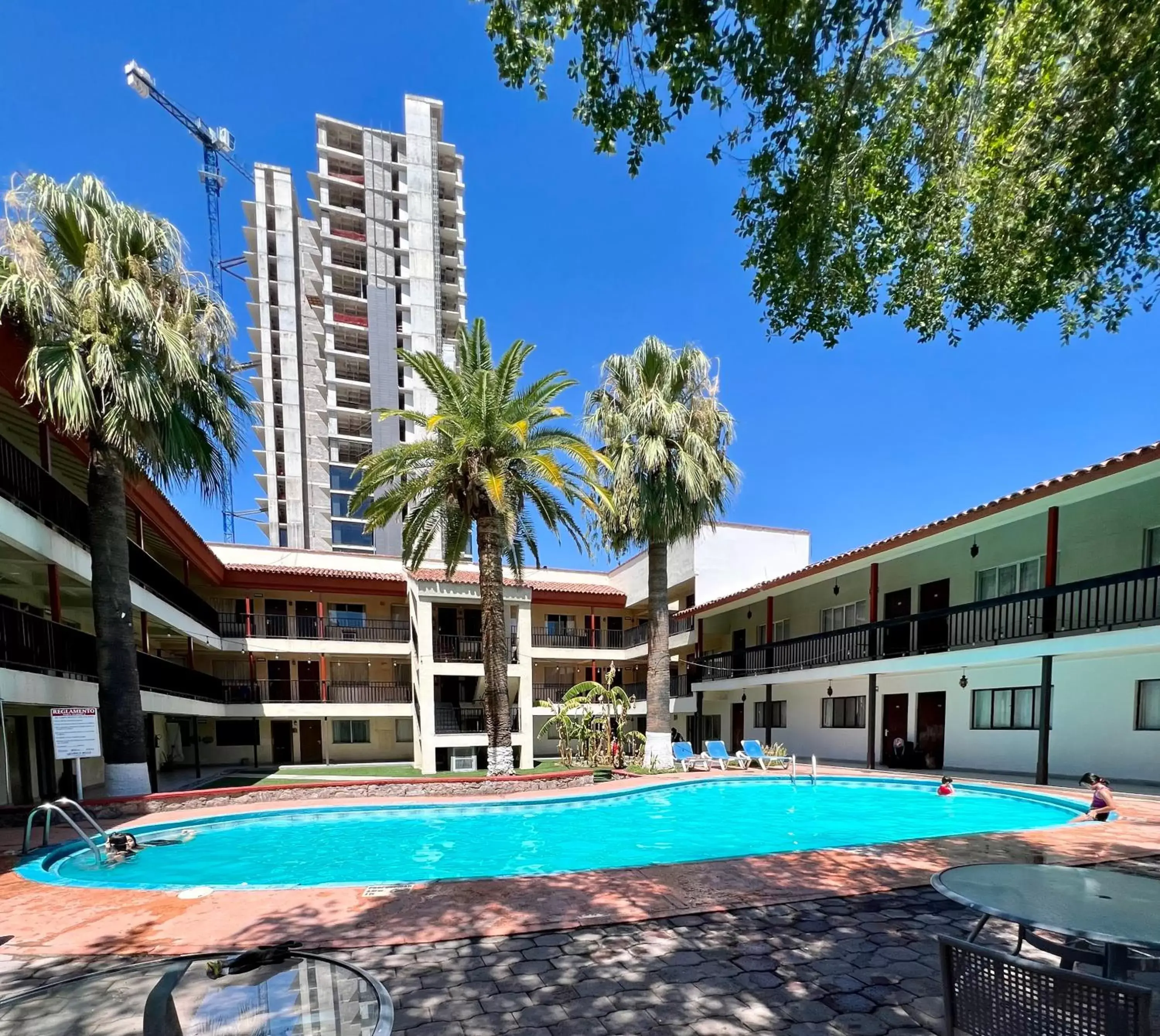 Patio, Swimming Pool in Hotel Bugambilia