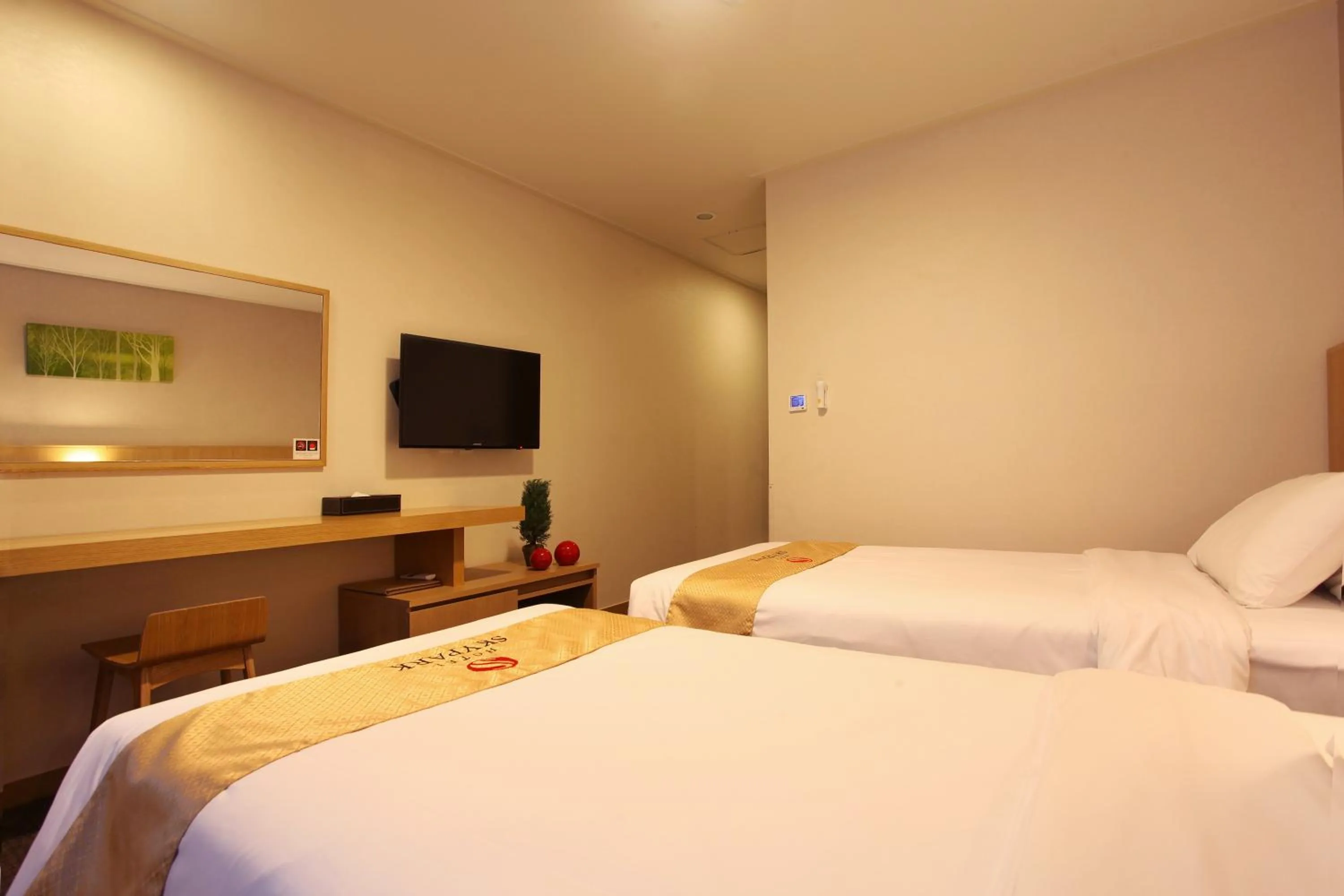 Bedroom, Bed in Hotel Skypark Jeju 1 Newly renovated