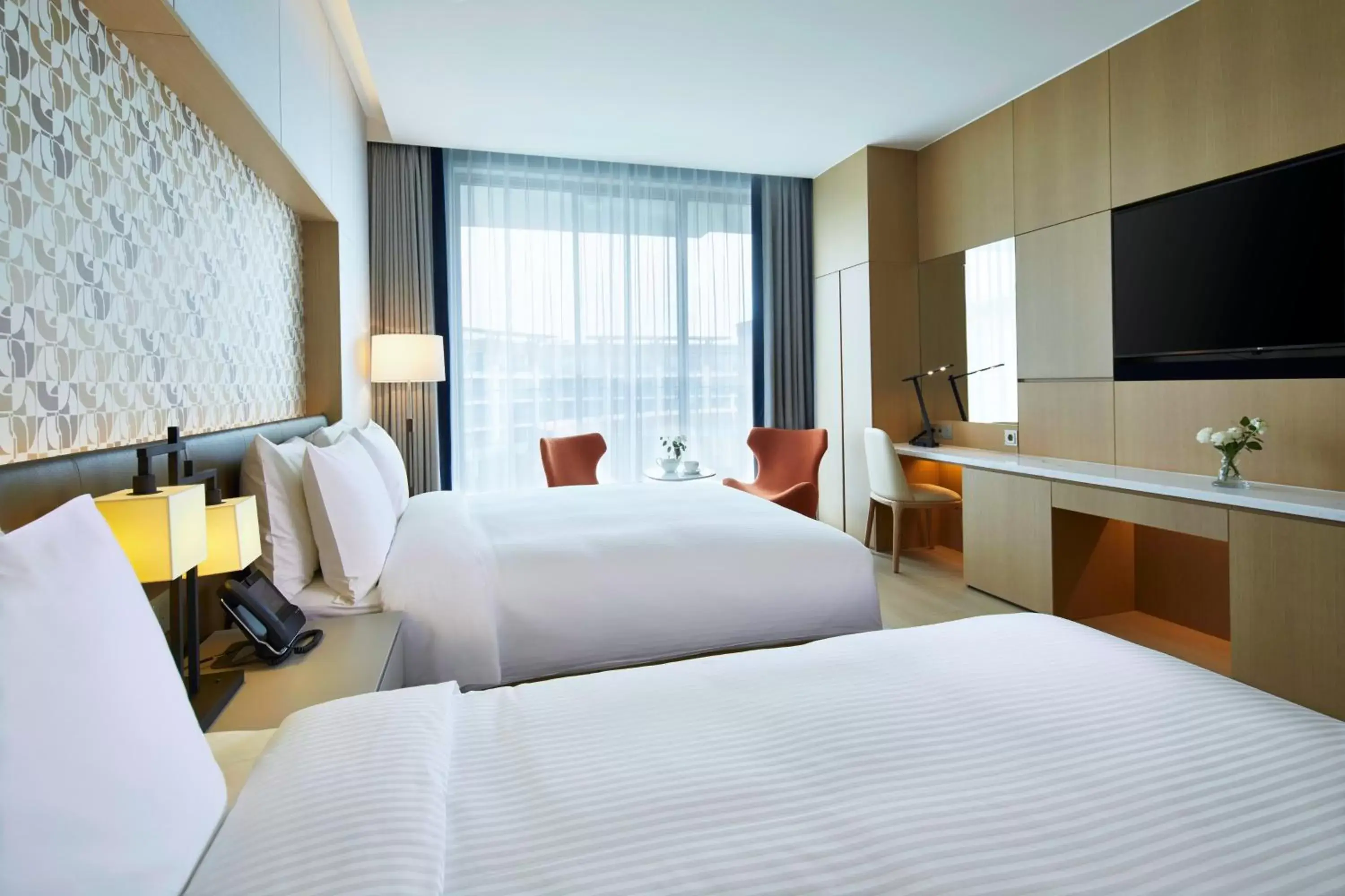 Bed in Jeju Shinhwa World Landing Resort