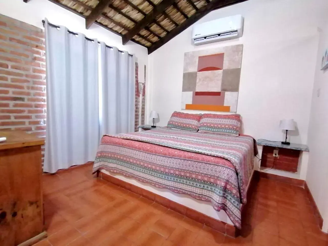 Bed in Sukasa Bungalows