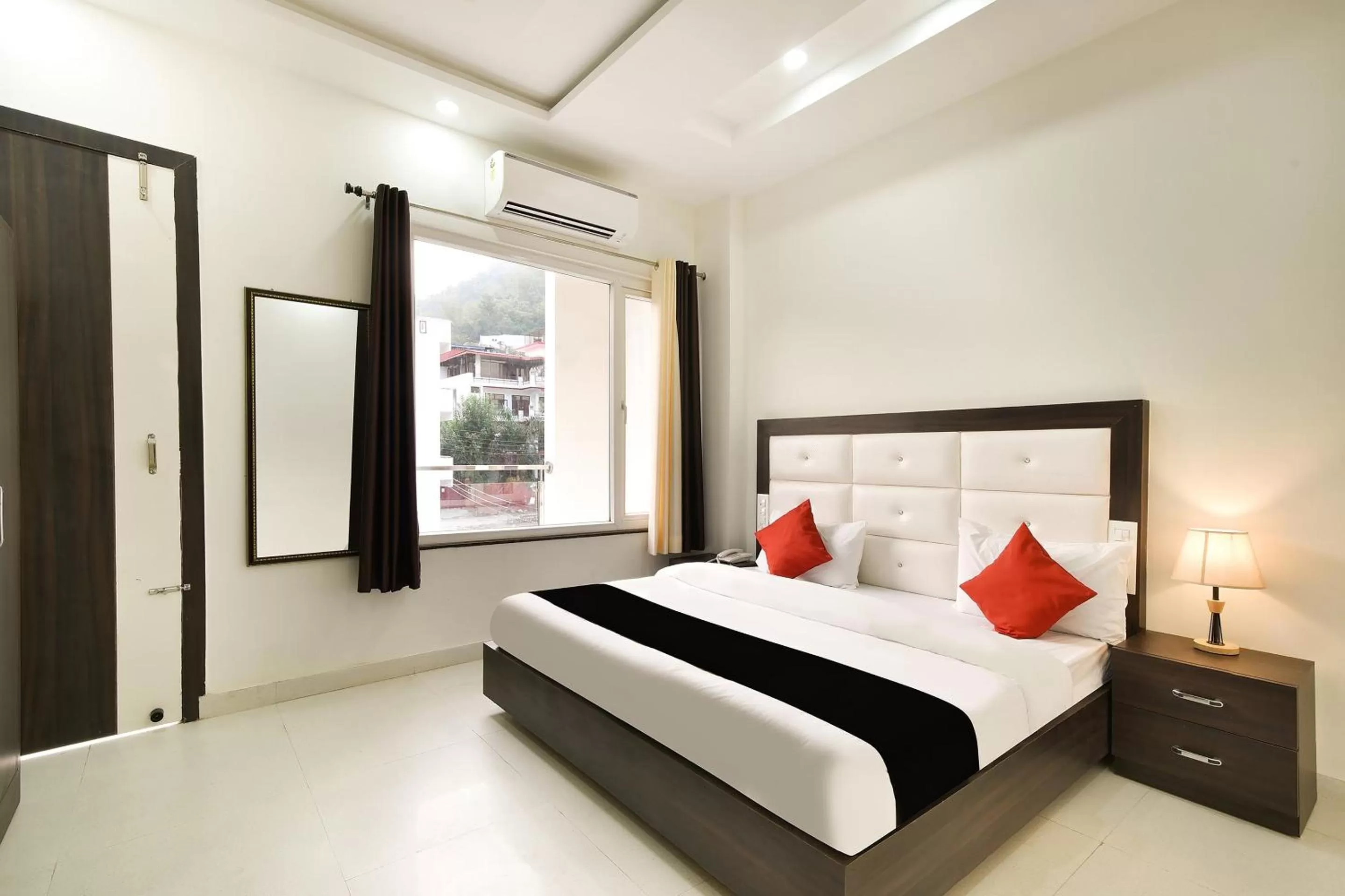 Bedroom, Bed in Capital O Yogasthali Inn Hotel And Spa