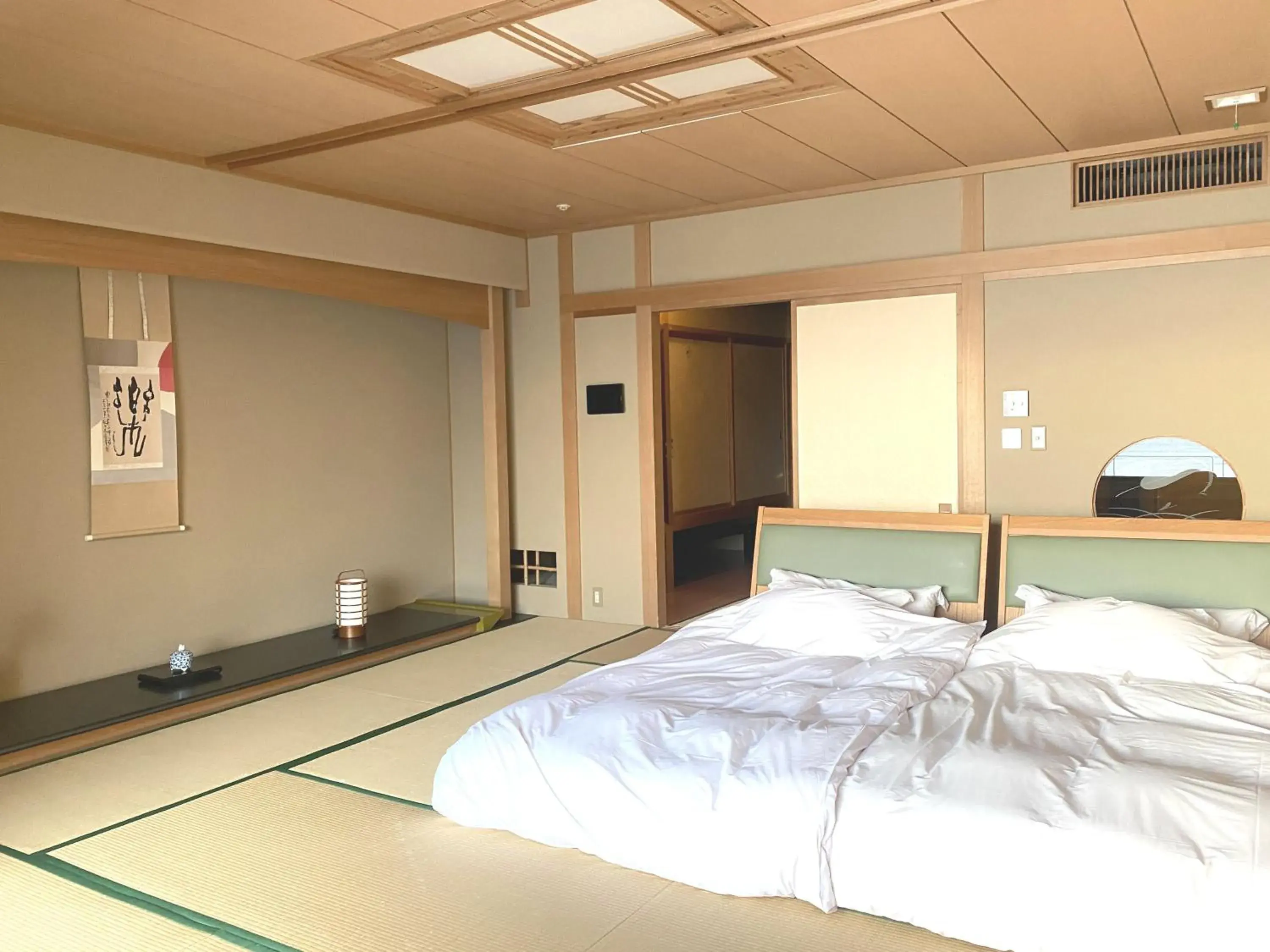 View (from property/room), Bed in Wakamatsu Hot Spring Resort