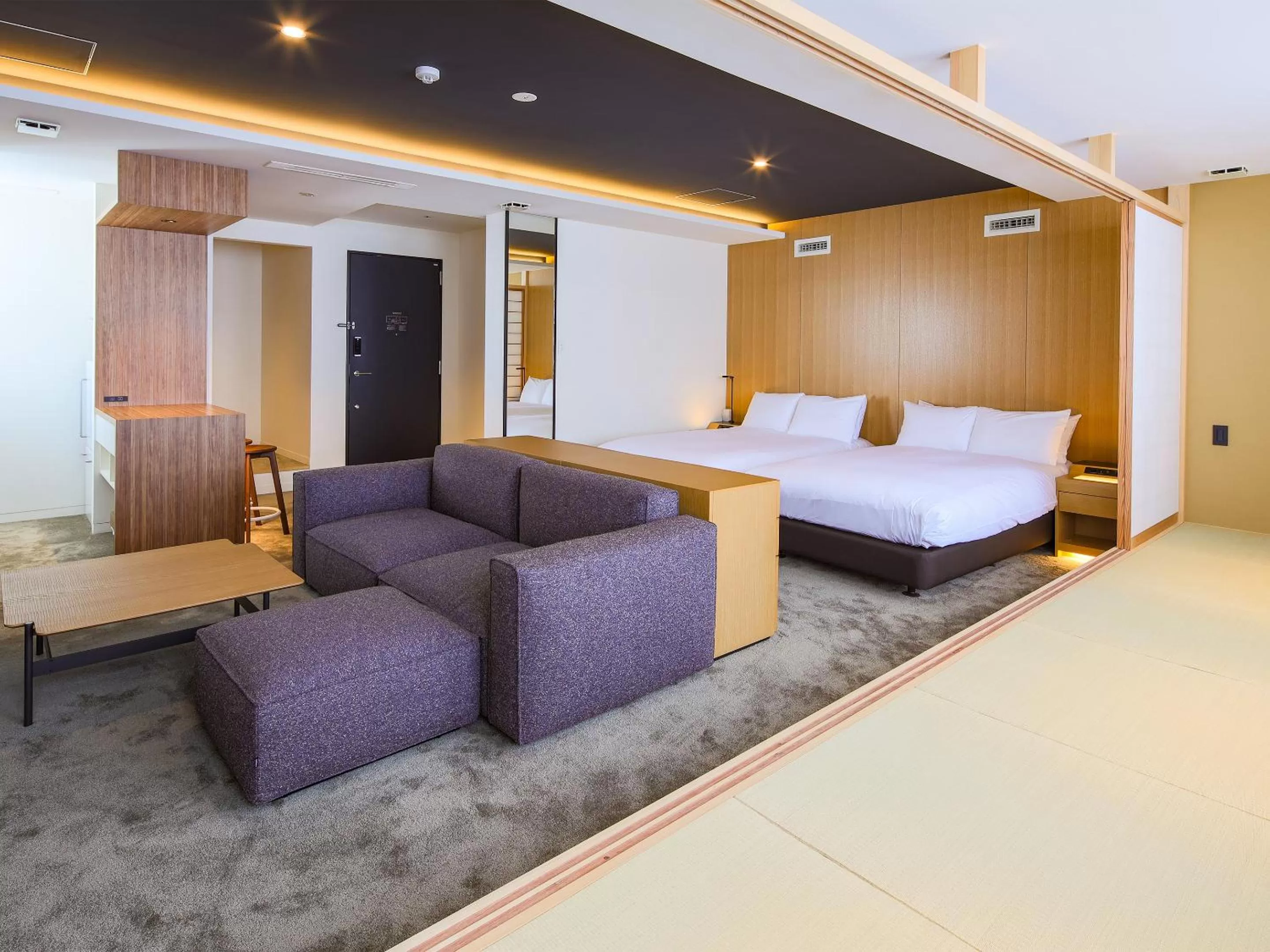 Living room, Bed in Hotel Muso