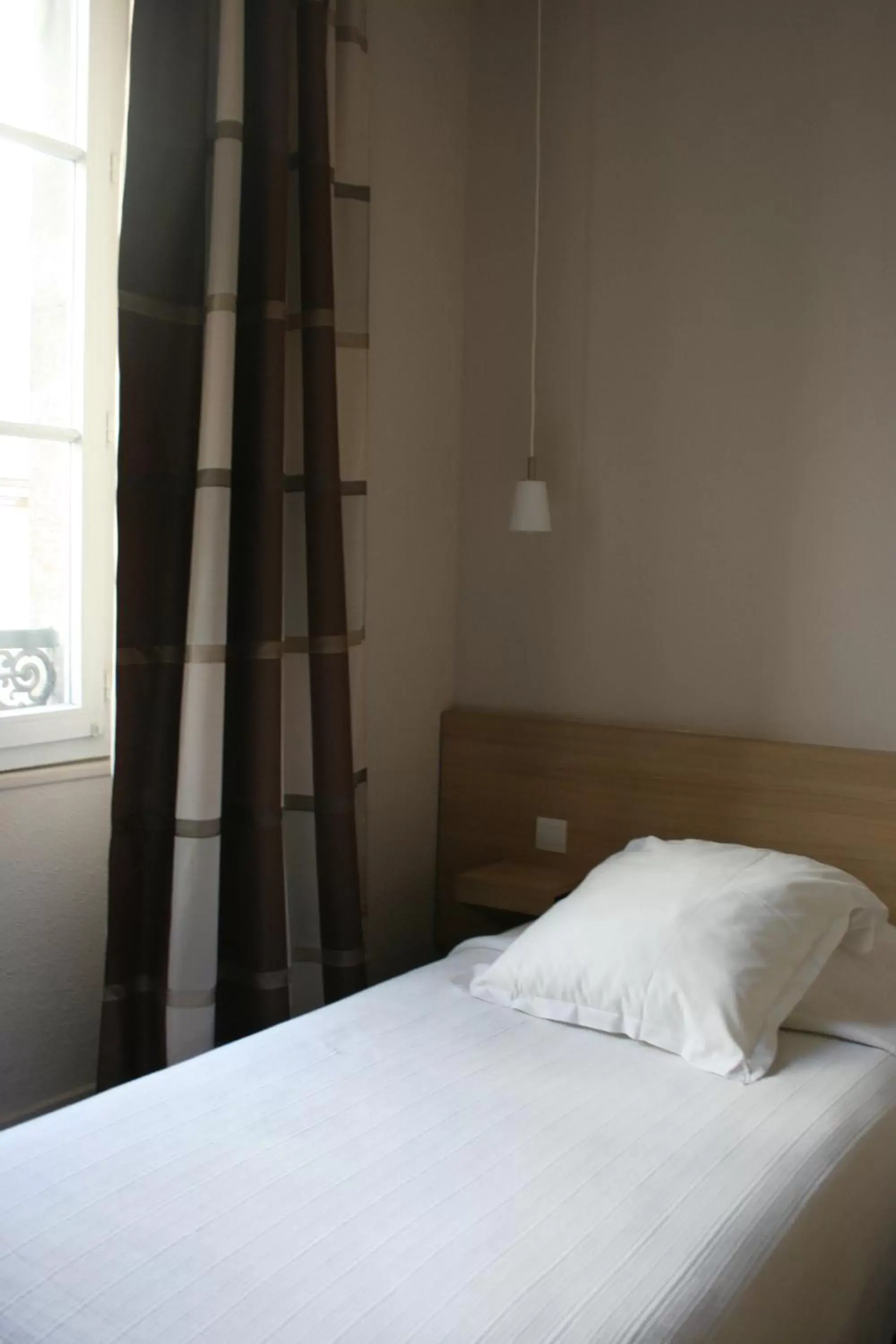 Bed in Hotel Gambetta