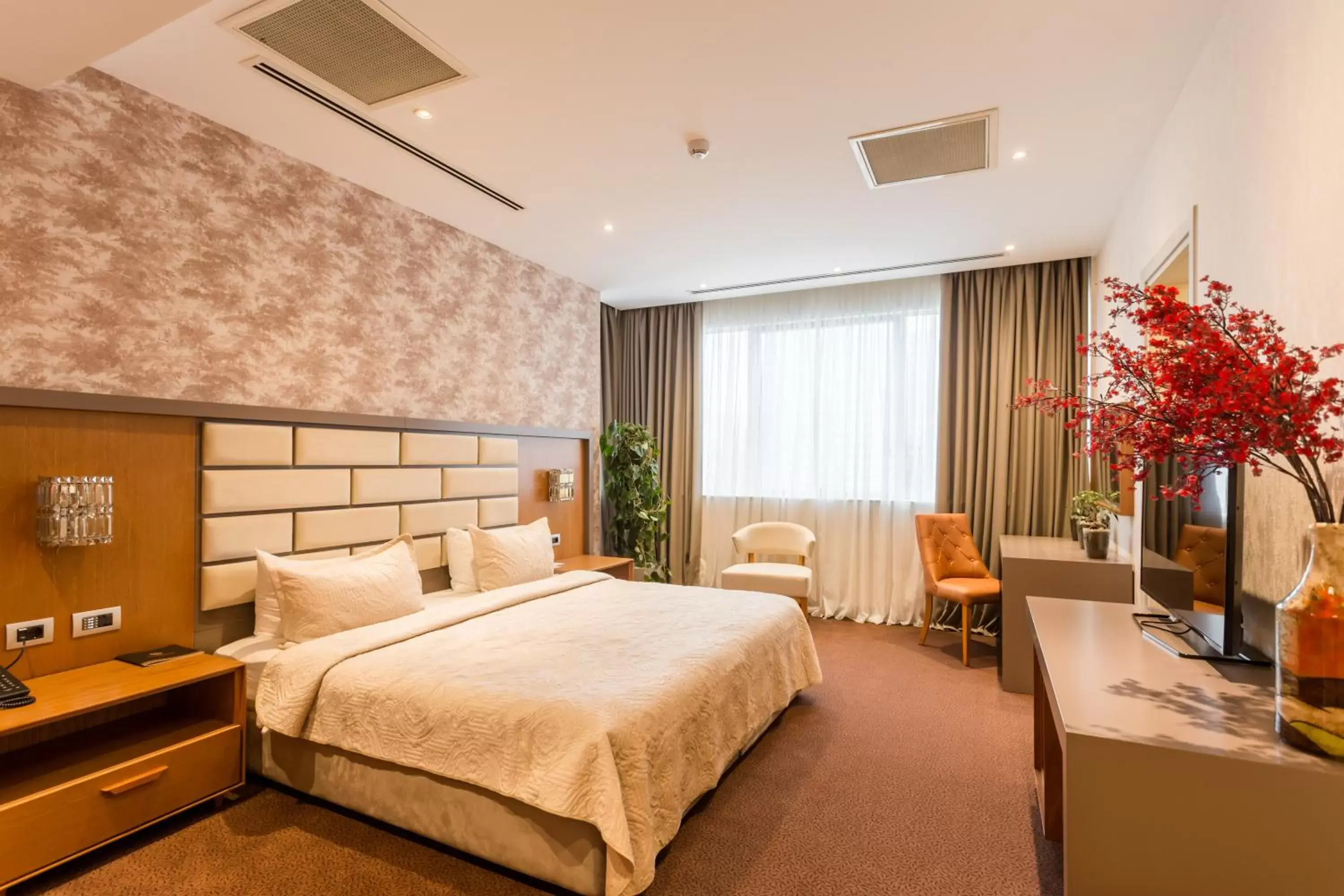 Bed in The Grand Gloria Hotel Bed in The Grand Gloria Hotel