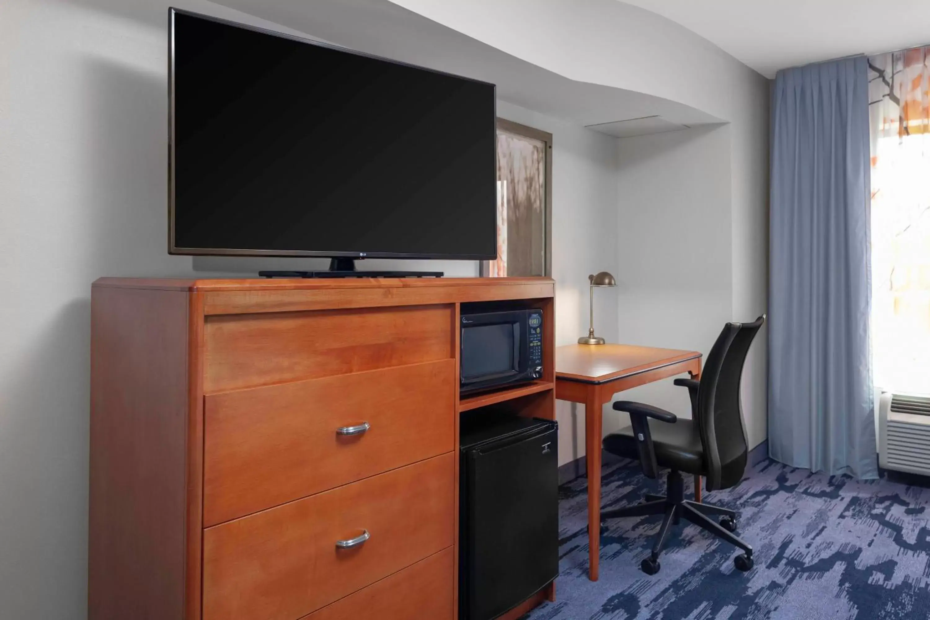 Photo of the whole room, TV/Entertainment Center in Fairfield Inn & Suites by Marriott Matthews Charlotte