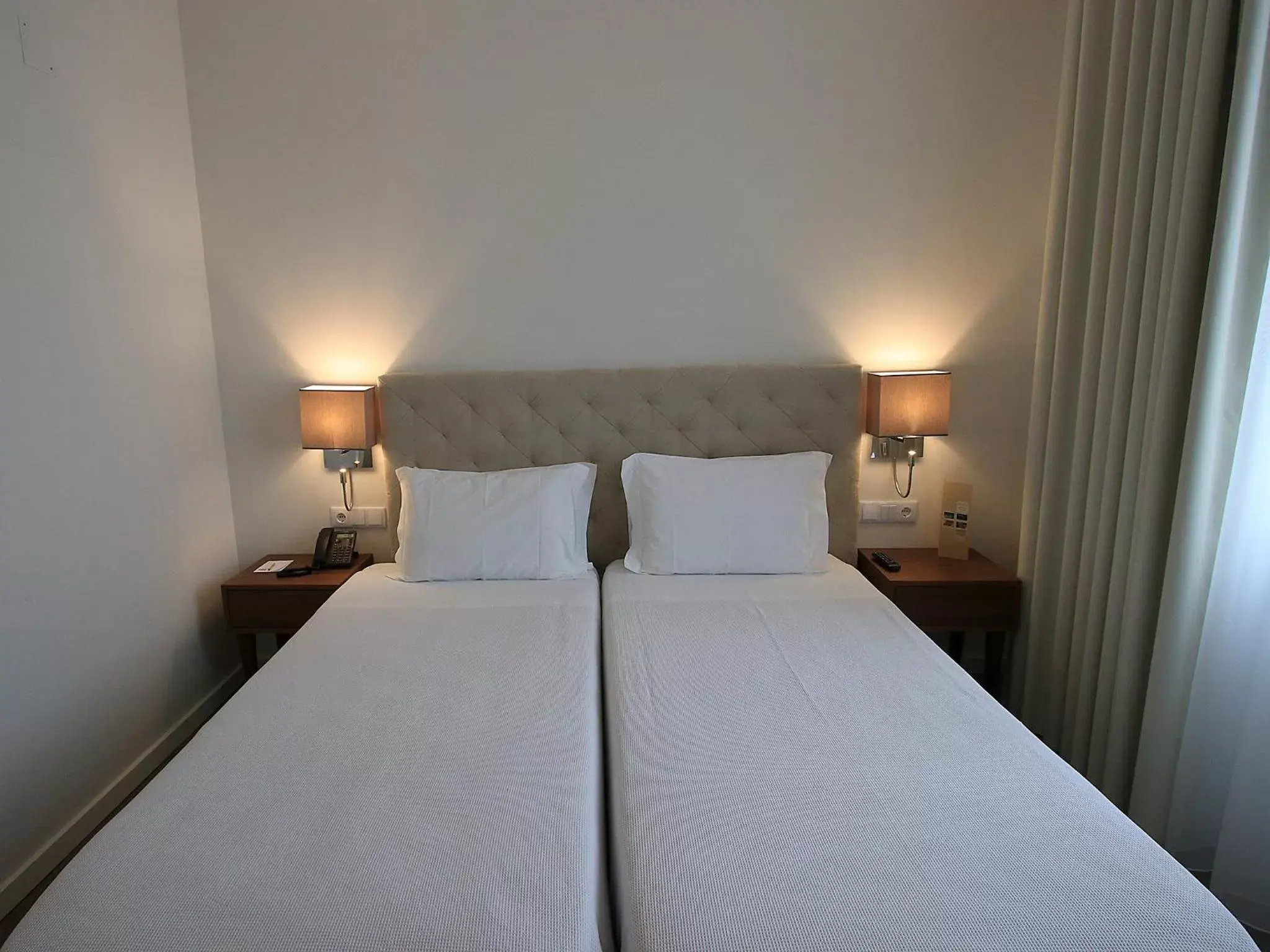 Bed in Consolata Hotel