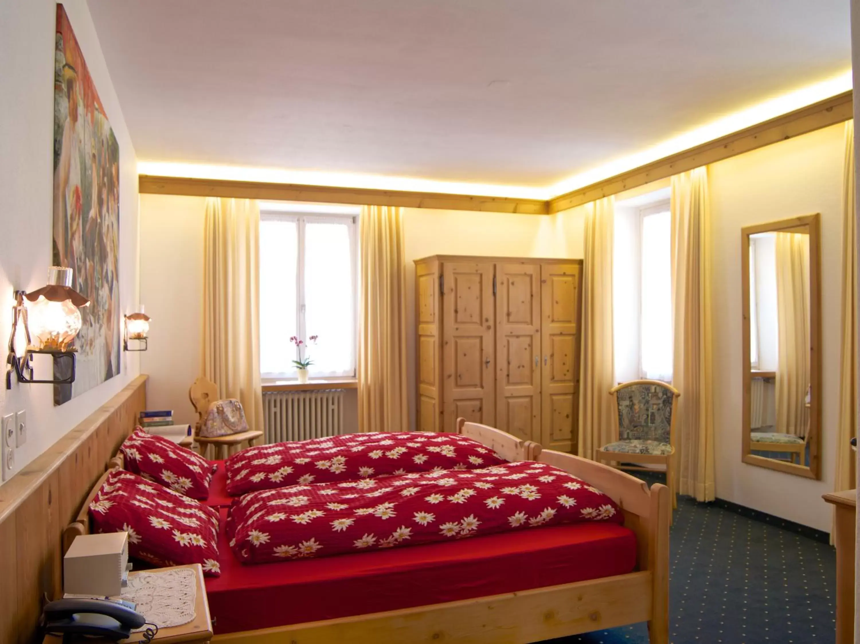 Bed in Poschiavo Suisse Hotel