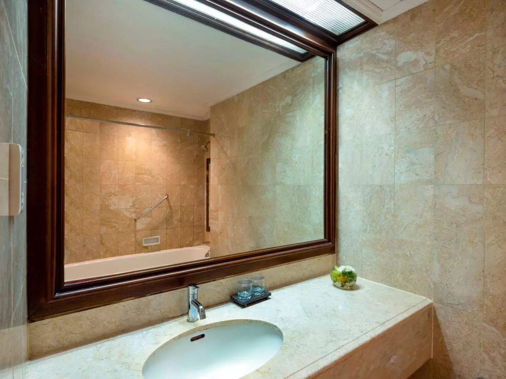 Bathroom in Hotel Ciputra Jakarta managed by Swiss-Belhotel International