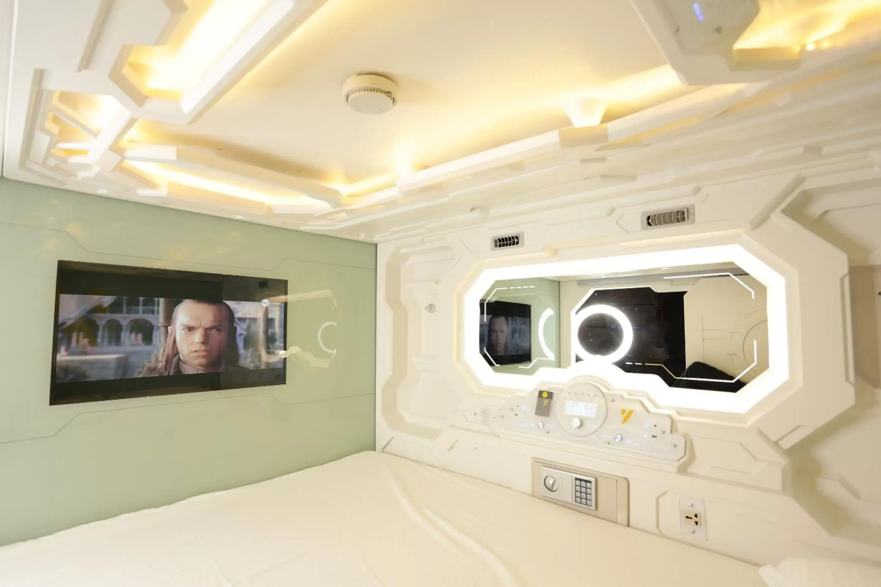 Bedroom in The Yellow Capsule Experience