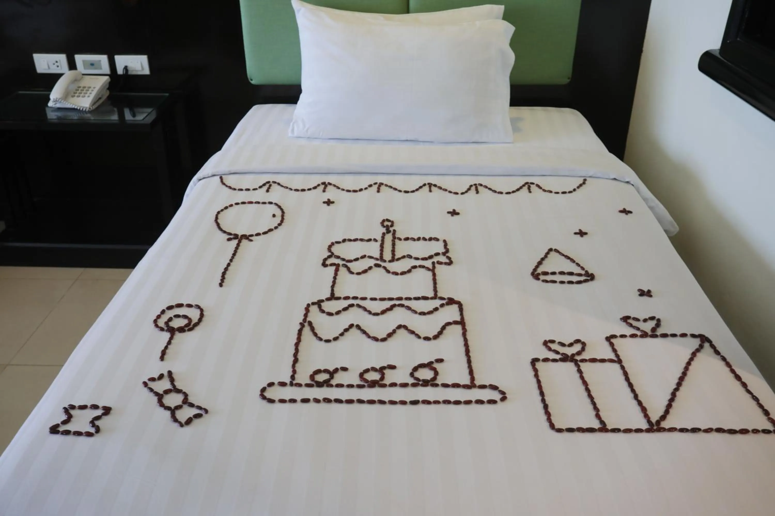 Bed in Woraburi Phuket Resort & Spa - SHA Plus