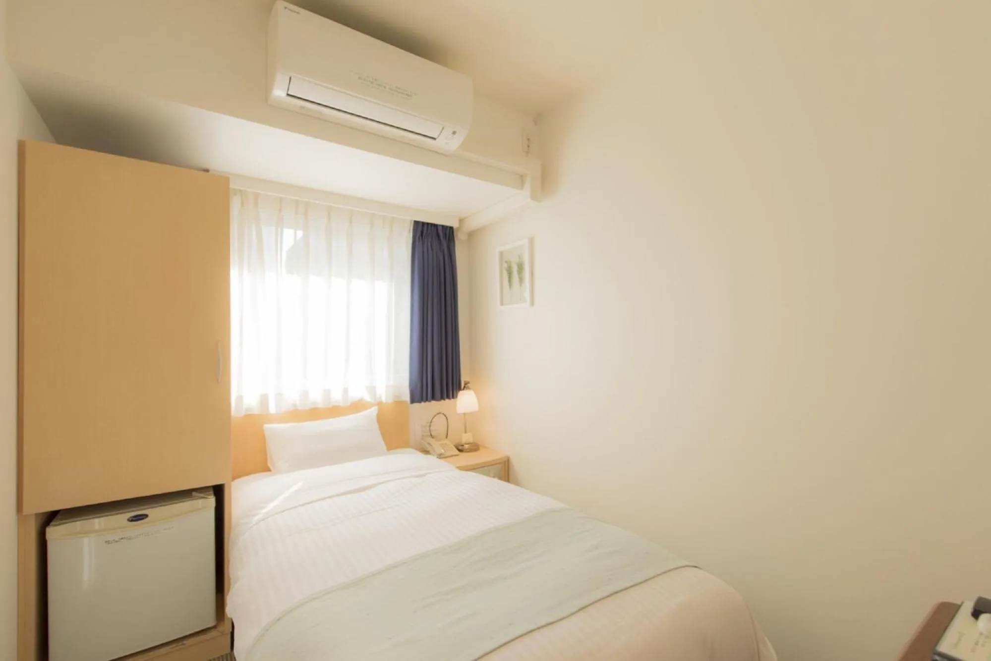 Photo of the whole room, Bed in Hotel Famy Inn Kinshicho