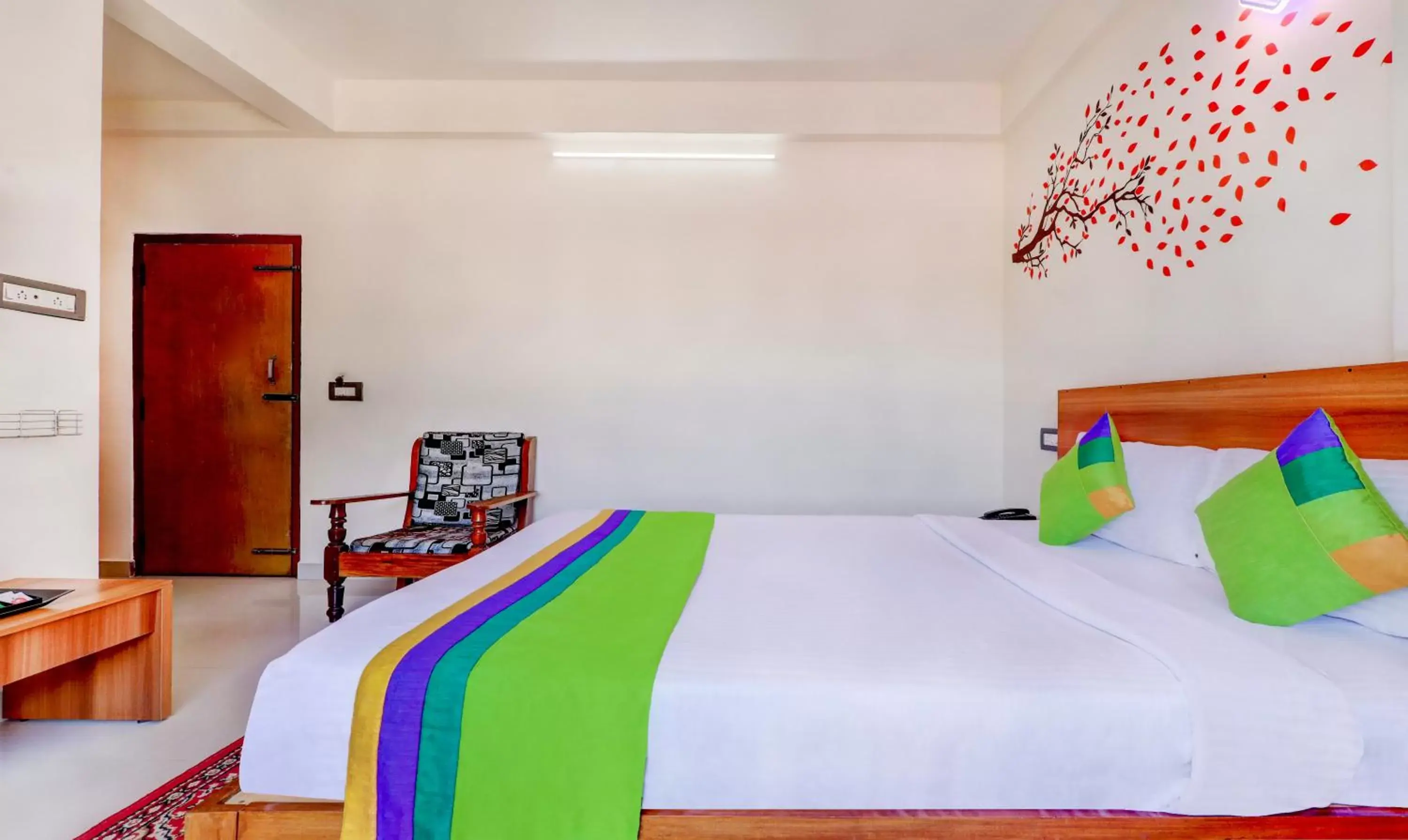 Bedroom, Bed in Treebo Atithi Comforts, 1 Km From Nisargadhama Forest Bedroom, Bed in Treebo Atithi Comforts, 1 Km From Nisargadhama Forest