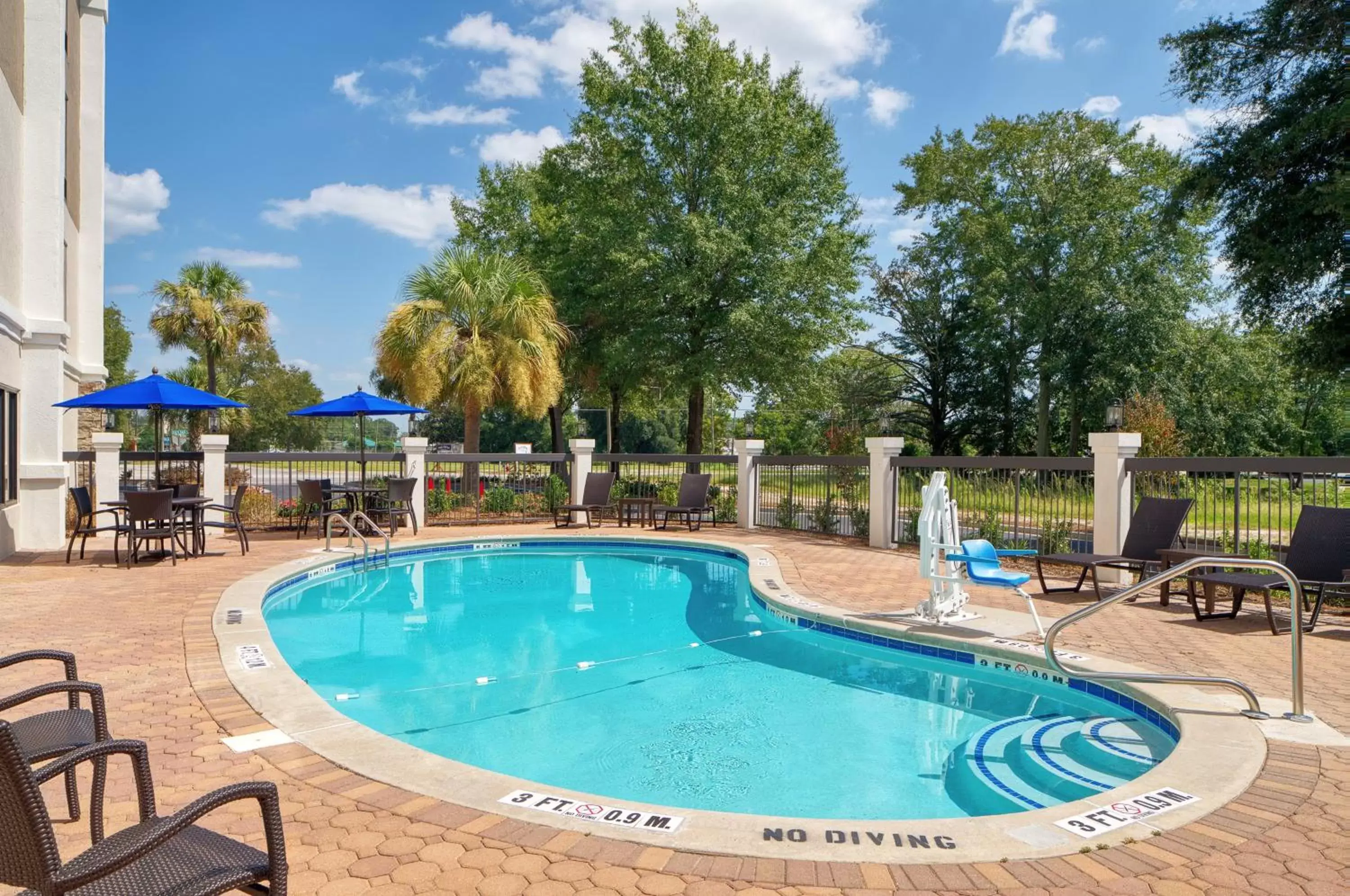 Swimming pool in Holiday Inn Express Statesboro, an IHG Hotel