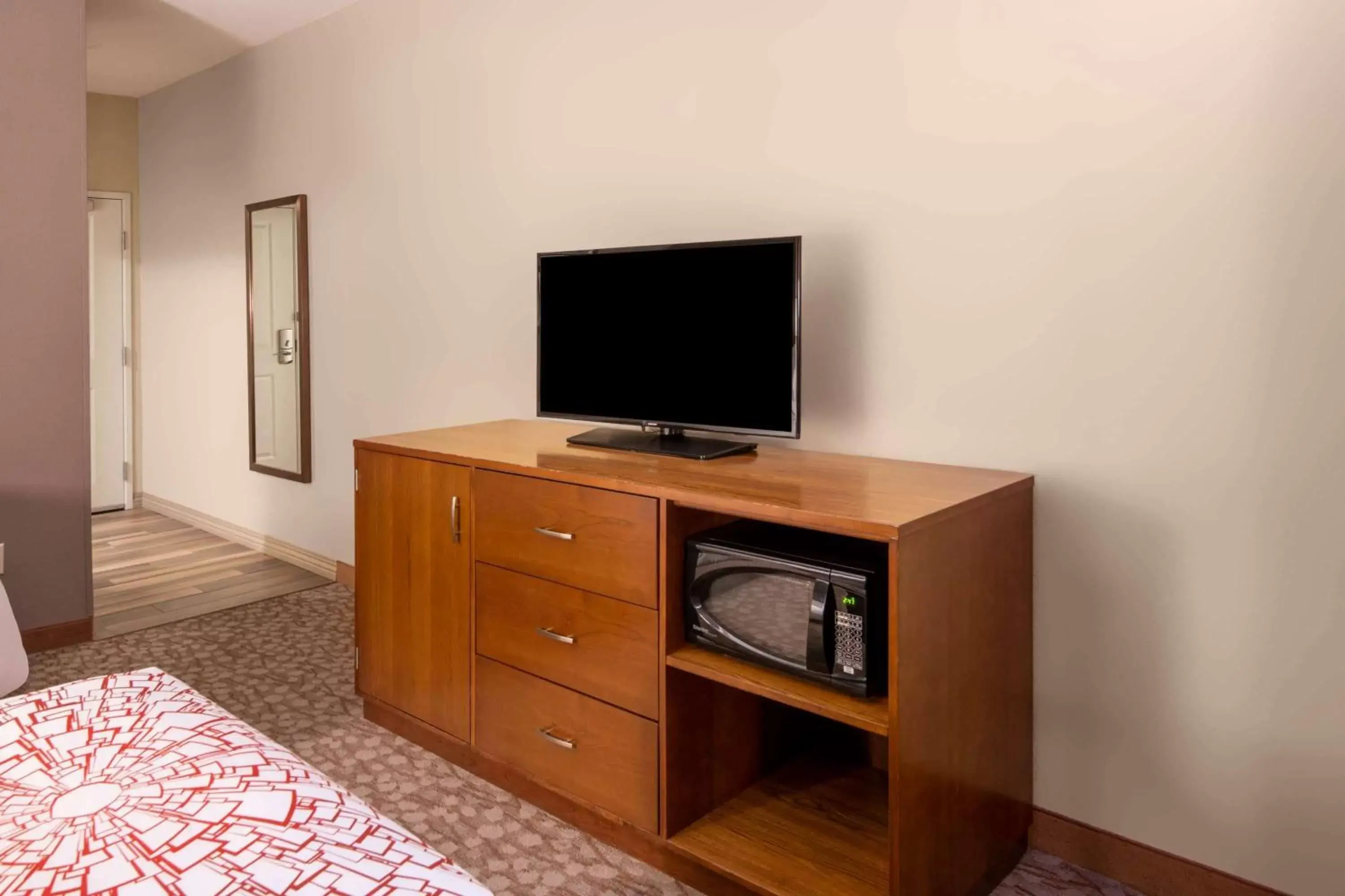 Photo of the whole room, TV/Entertainment Center in La Quinta by Wyndham Durango