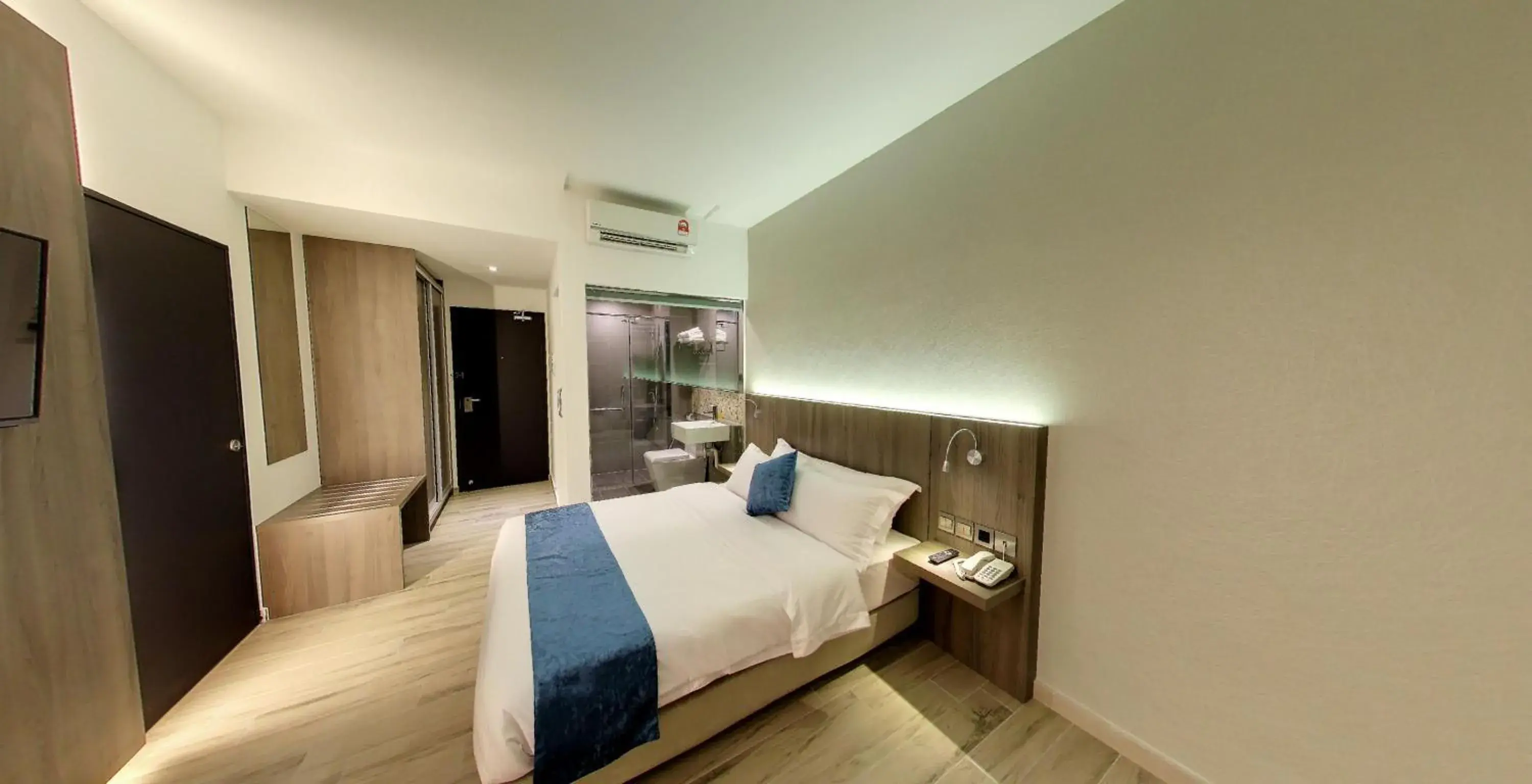 Bedroom in Flora by Crossroads Hotel