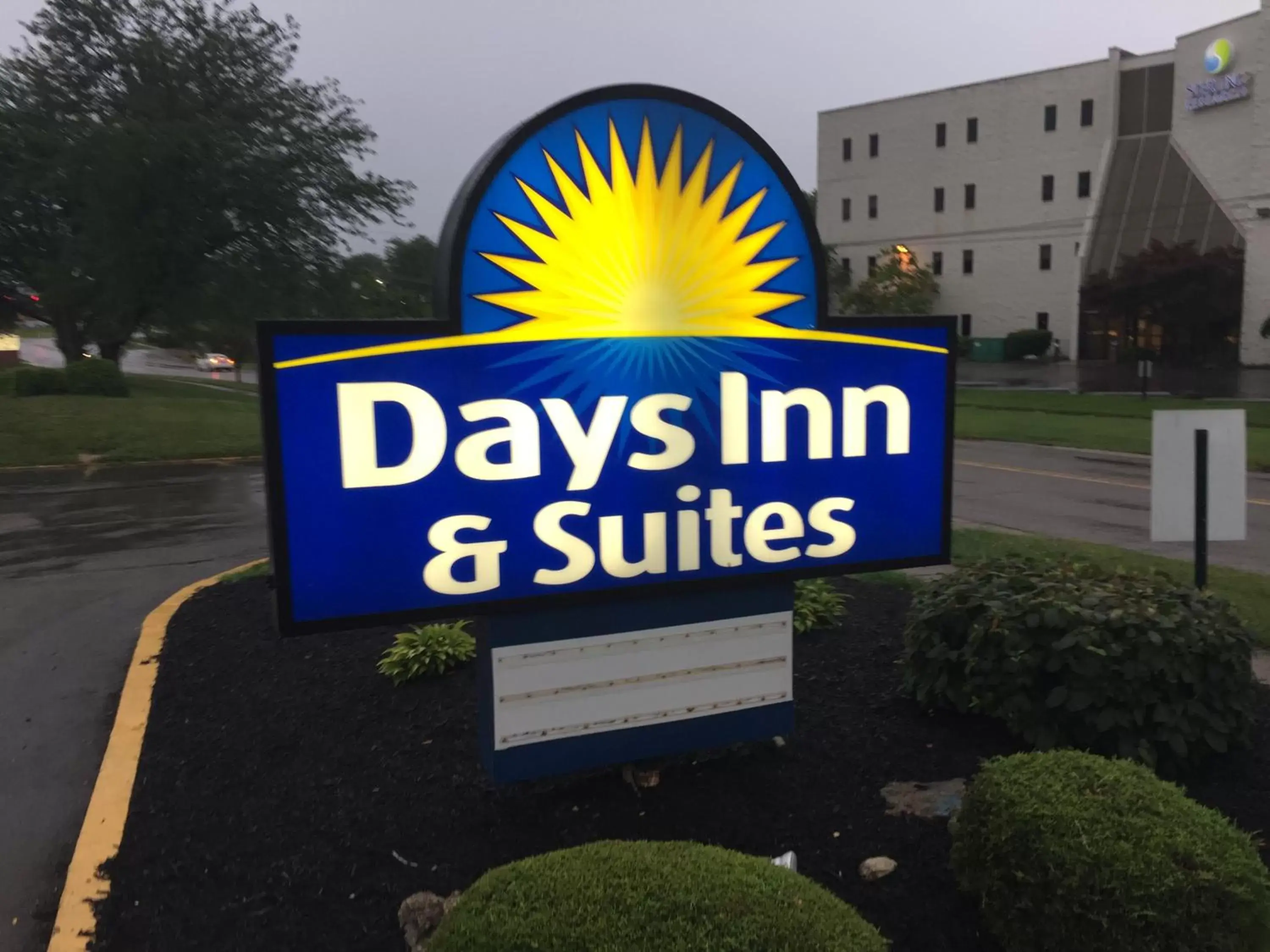 Property logo or sign in Days Inn & Suites by Wyndham Cincinnati North