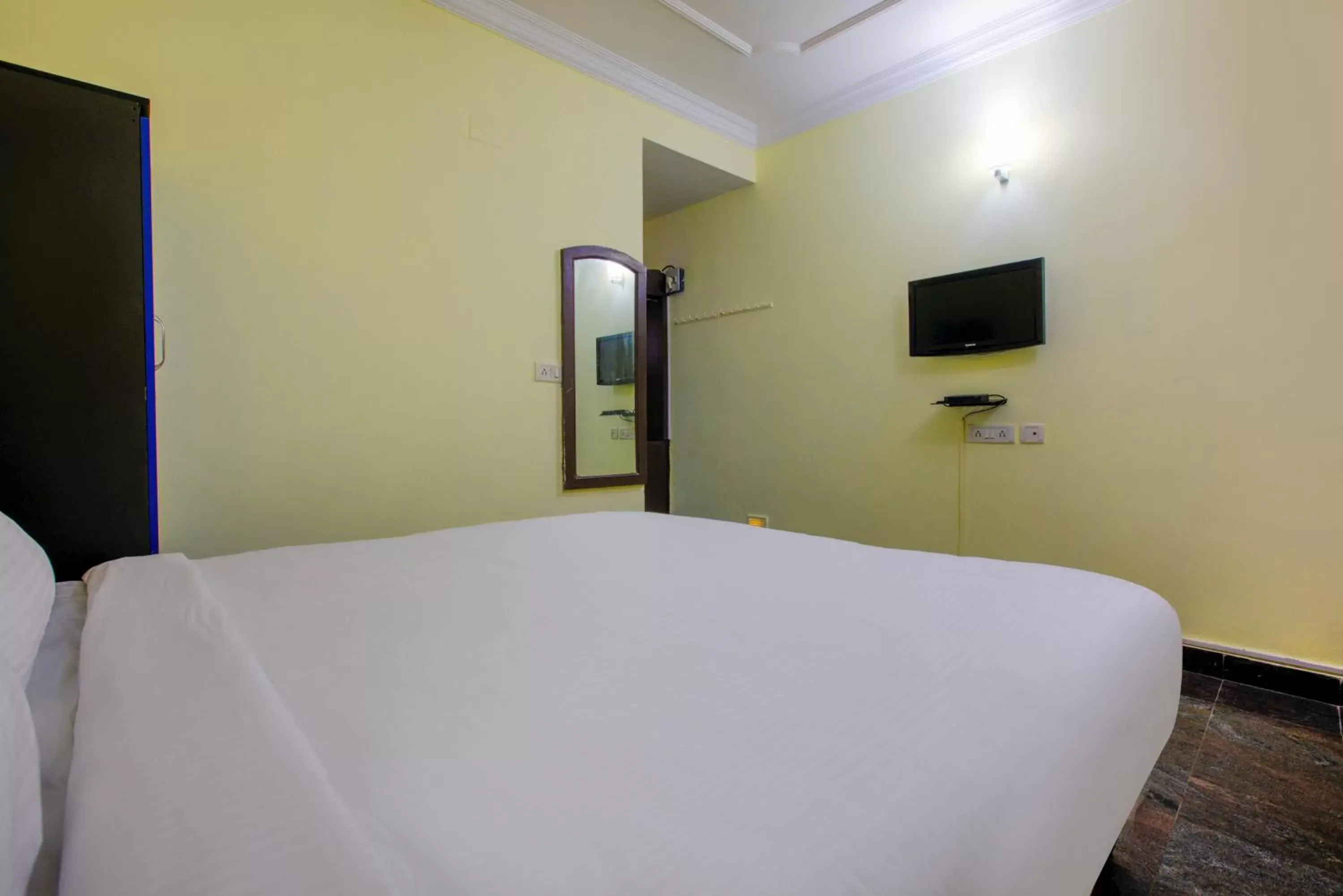 Bed in The Dolphin Park Hotel, Virugambakkam Bed in The Dolphin Park Hotel, Virugambakkam