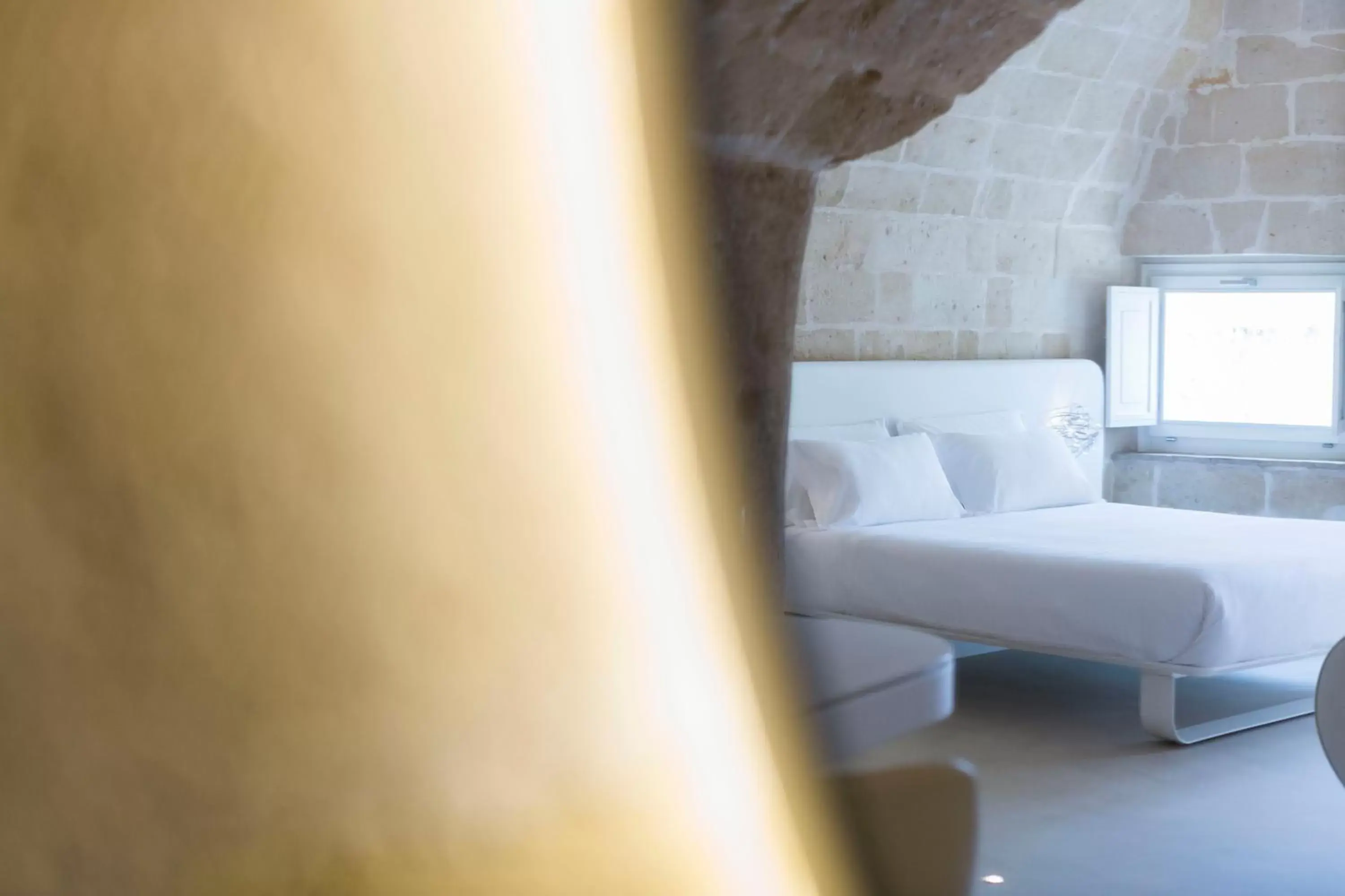 Bed in Aquatio Cave Luxury Hotel & SPA