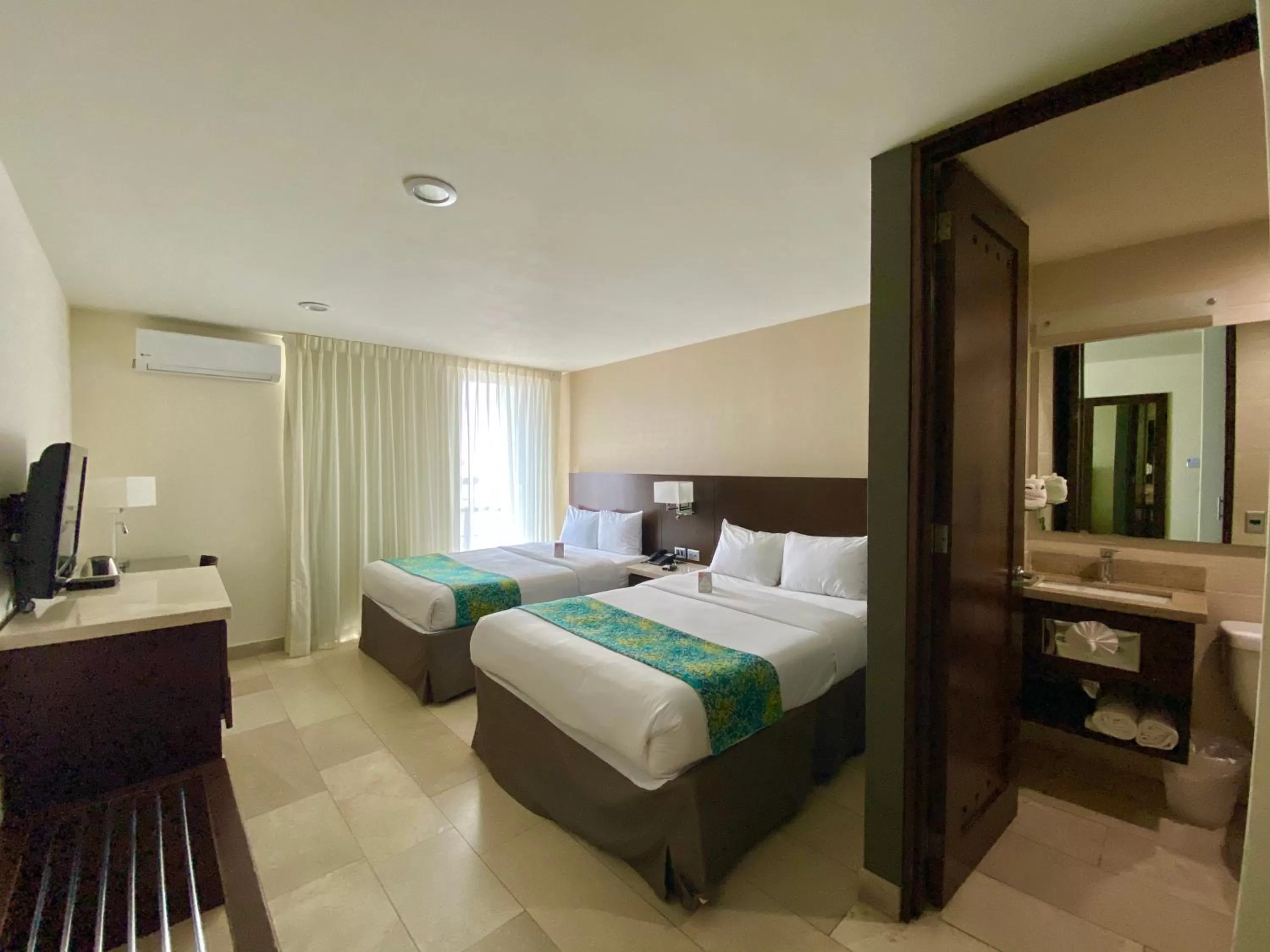 Bed in Seven Crown La Paz Malecon