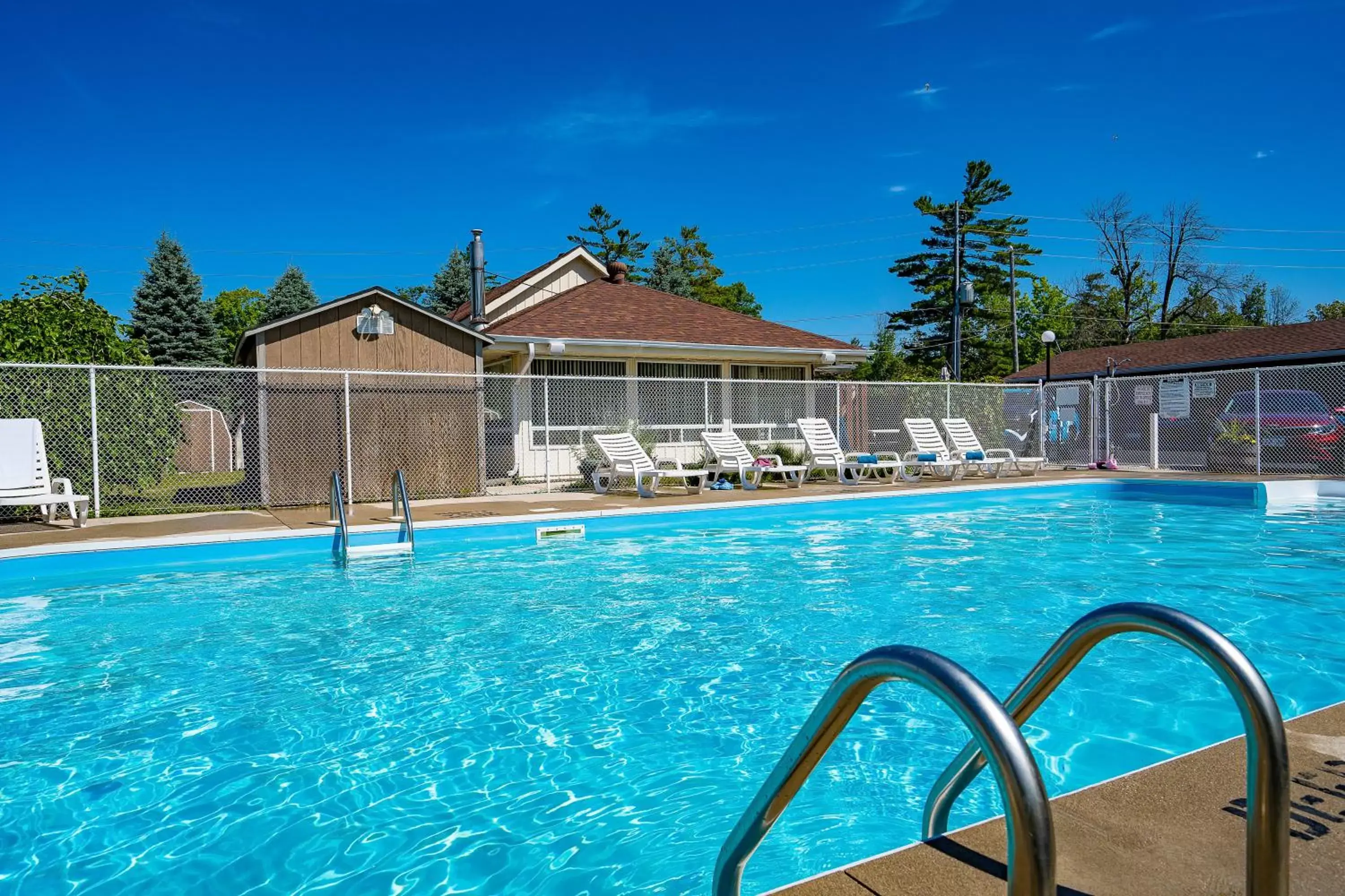 Pool view, Swimming Pool in Beach Club by Beach1 Motel