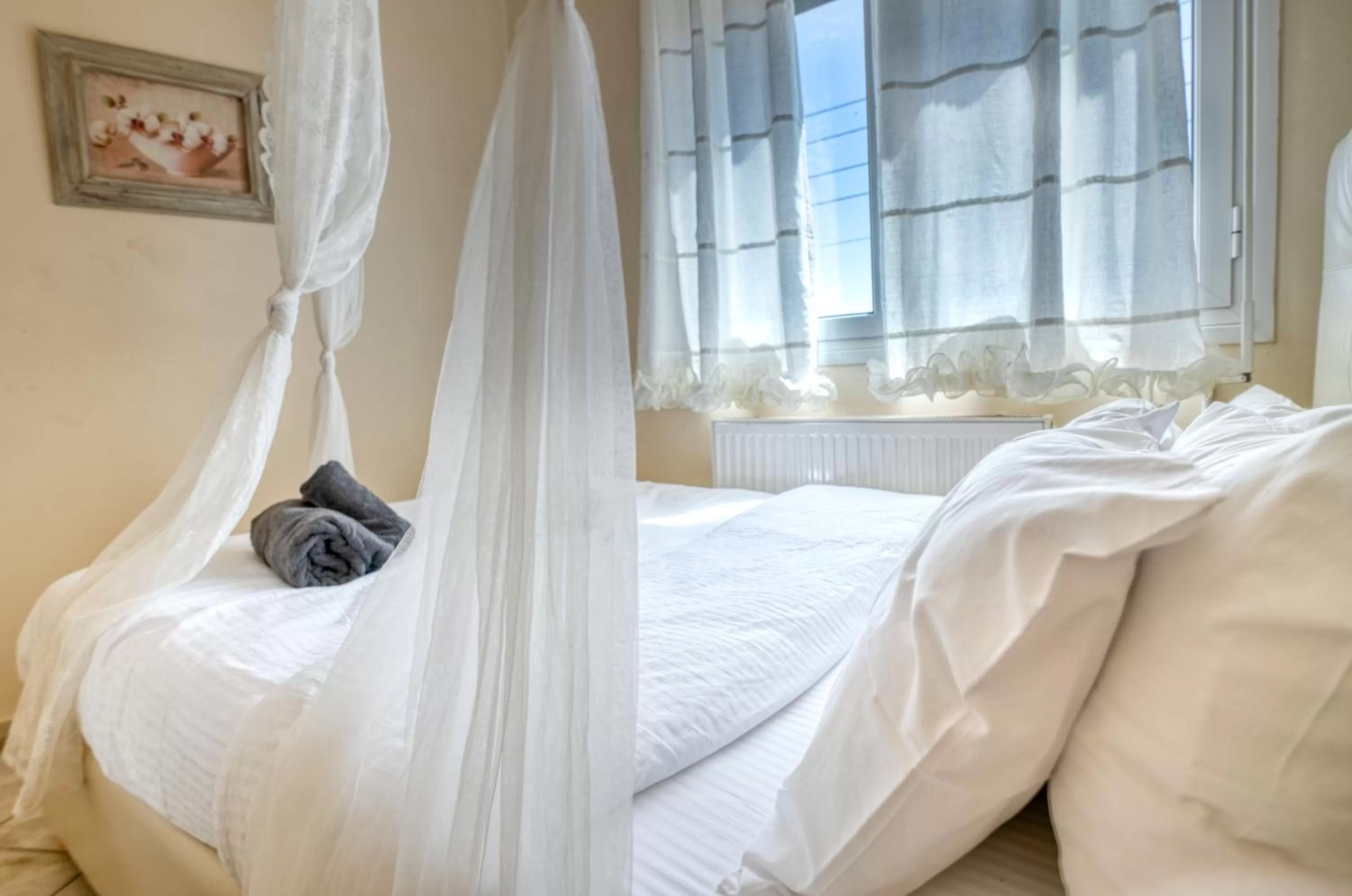 Bed in Votsalakia Hotel & Luxury Apartments