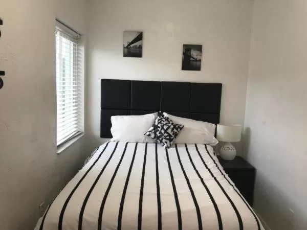 Bed in Green Seas Motel