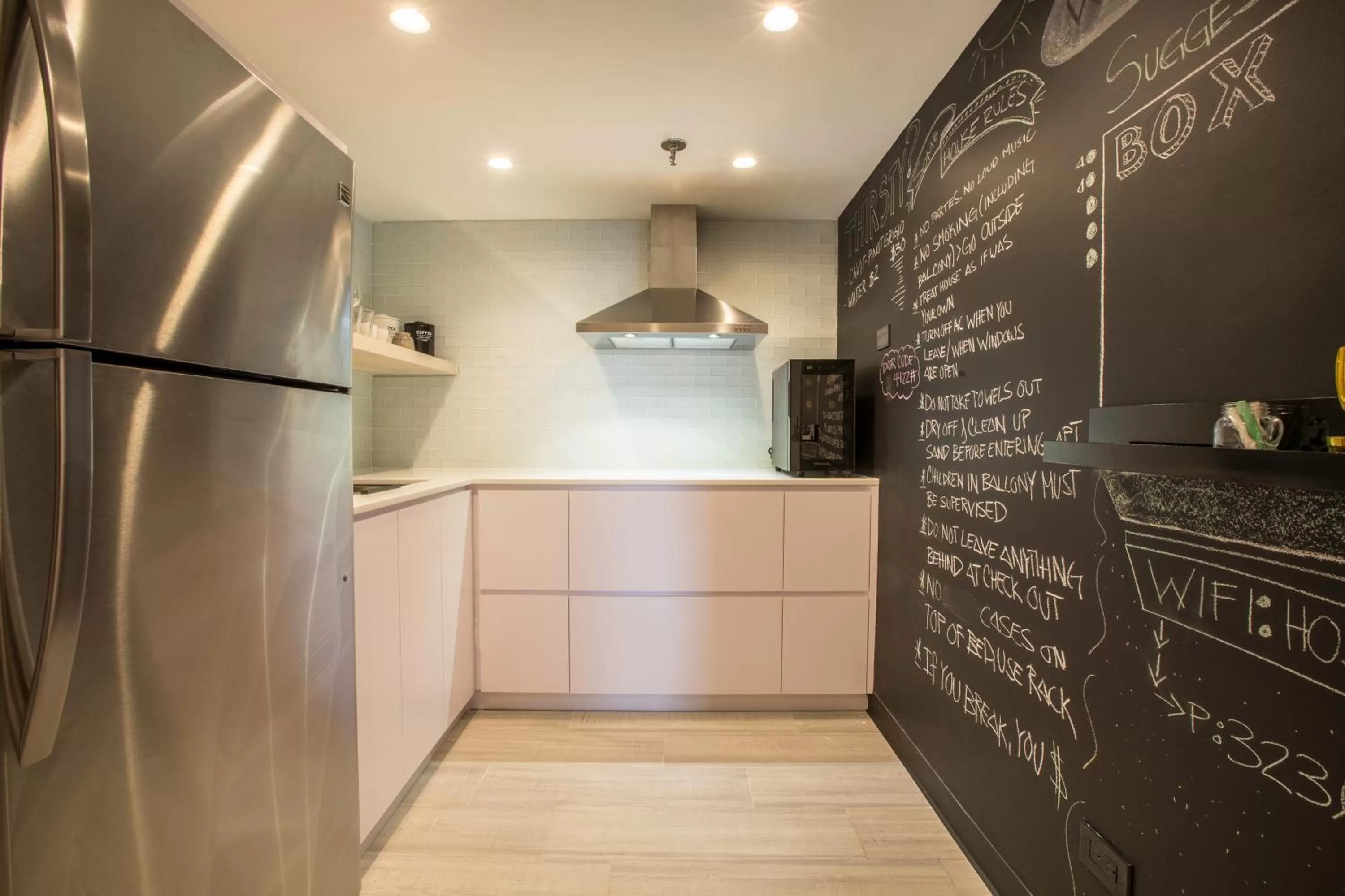 Kitchen or kitchenette in OCEAN VIEW DELUXE SUITE: PVT. BEACH & POOL