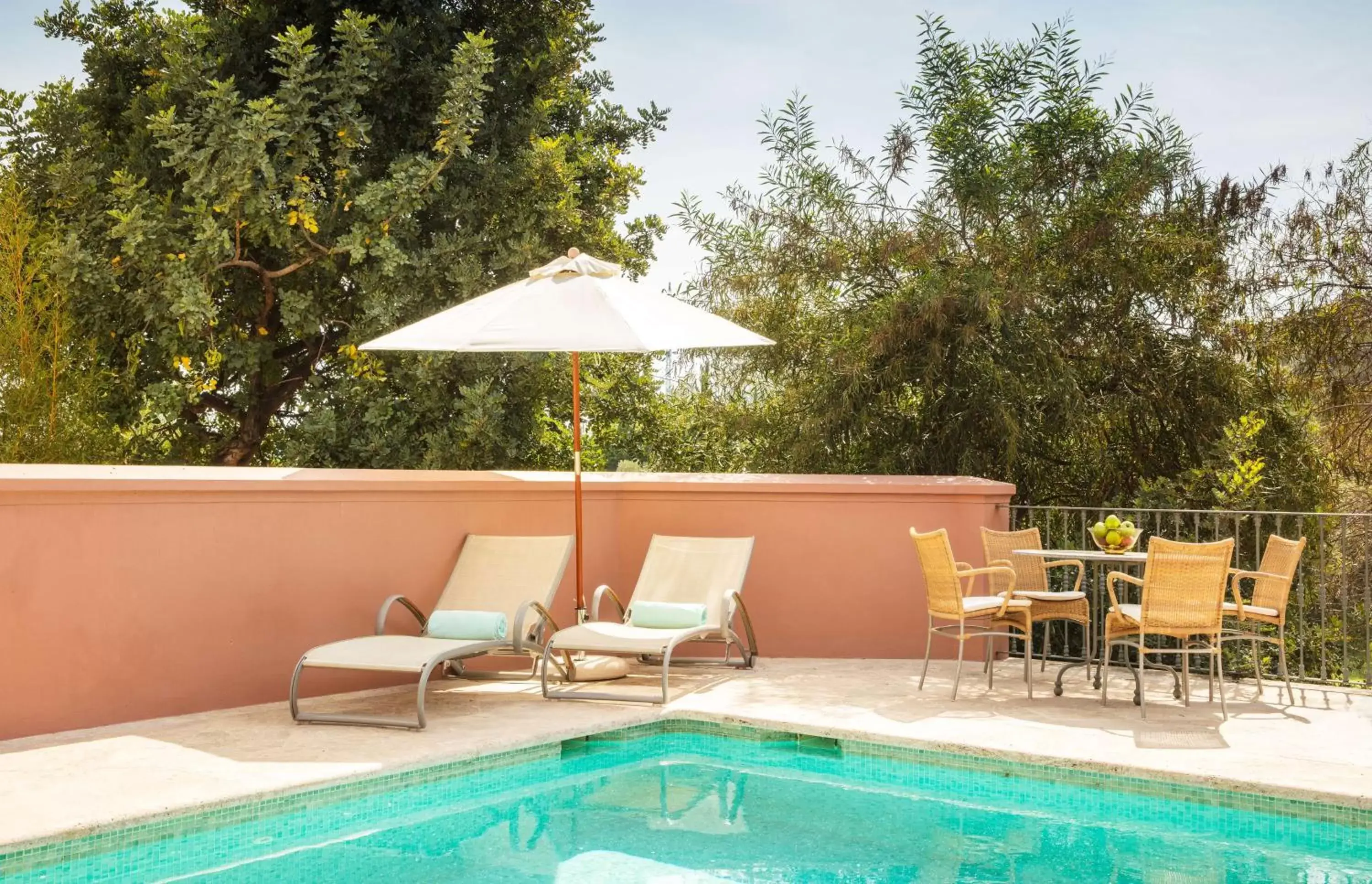 Seating area, Swimming Pool in Anantara Villa Padierna Palace Benahavís Marbella Resort - A Leading Hotel of the World