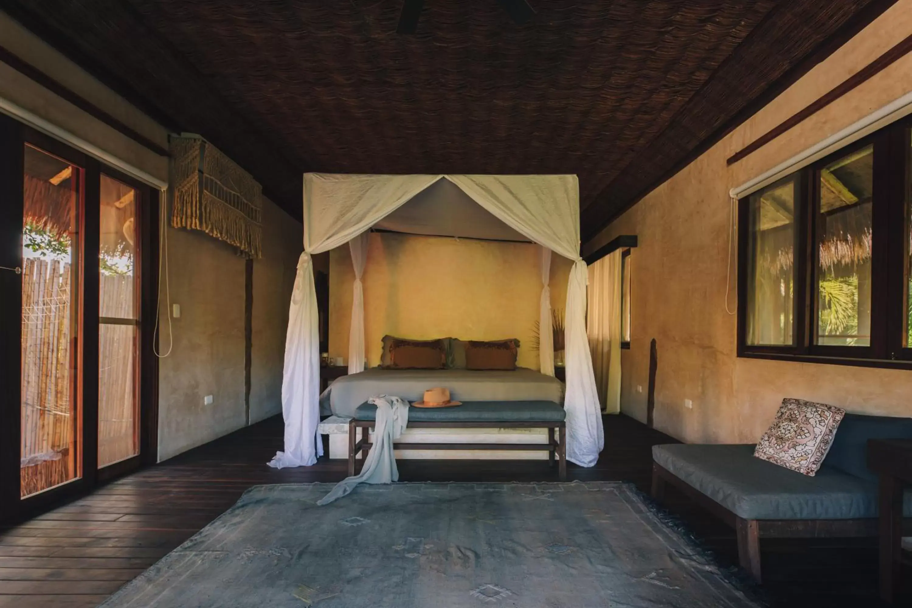 Bed, Seating Area in Radhoo Tulum