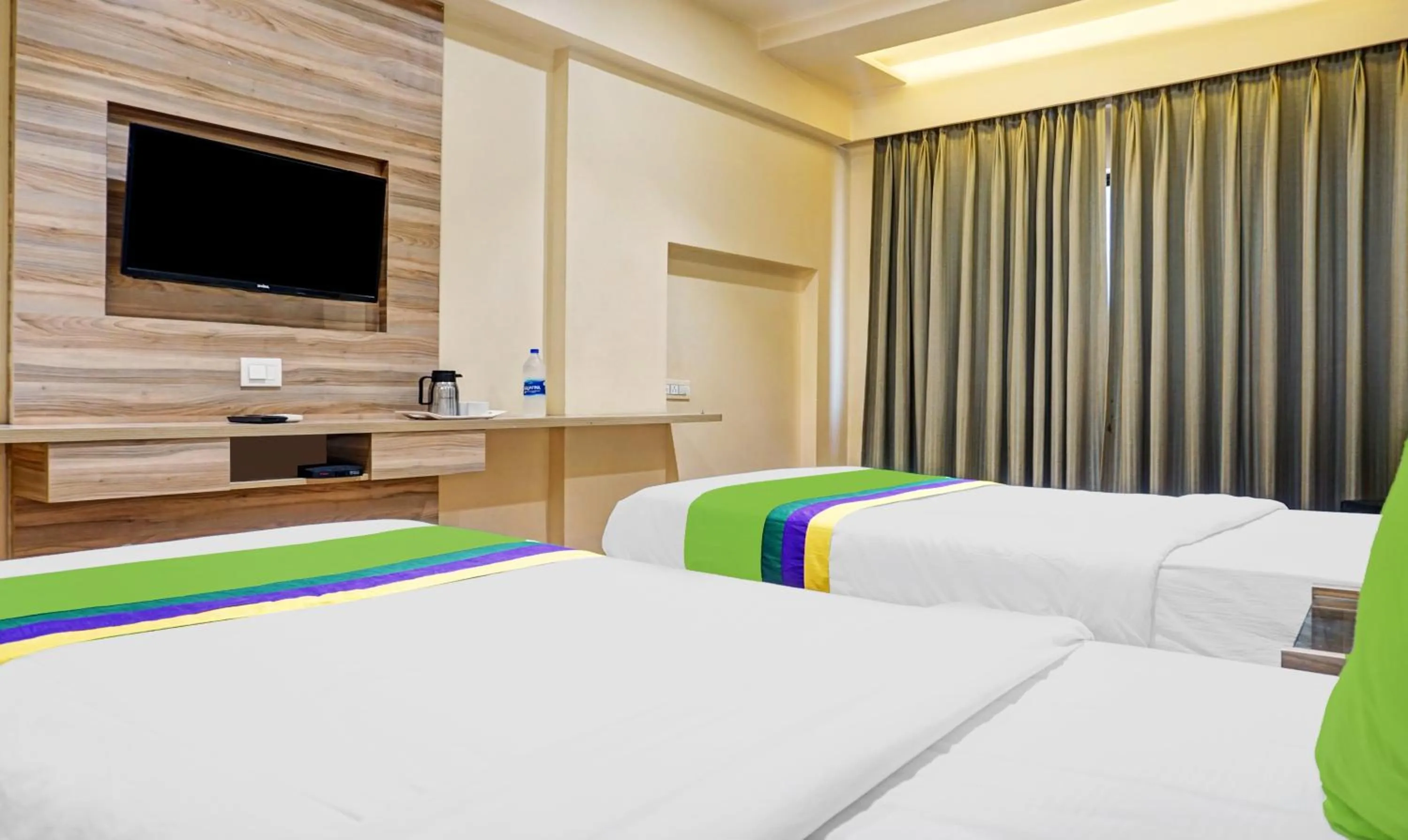 Bedroom, Bed in Treebo Classic Grande, Camp