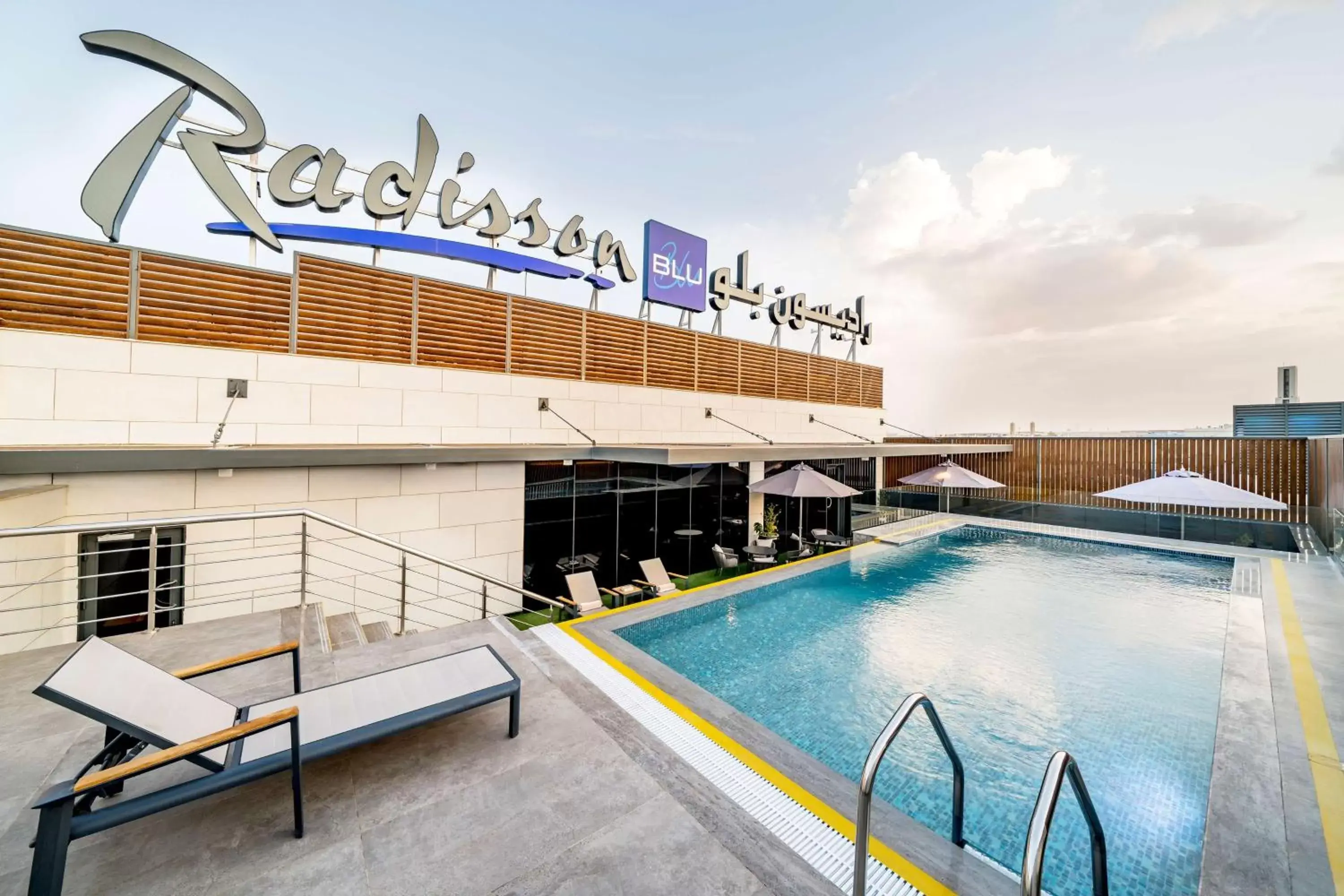 Pool view, Property Building in Radisson Blu Hotel Riyadh Qurtuba