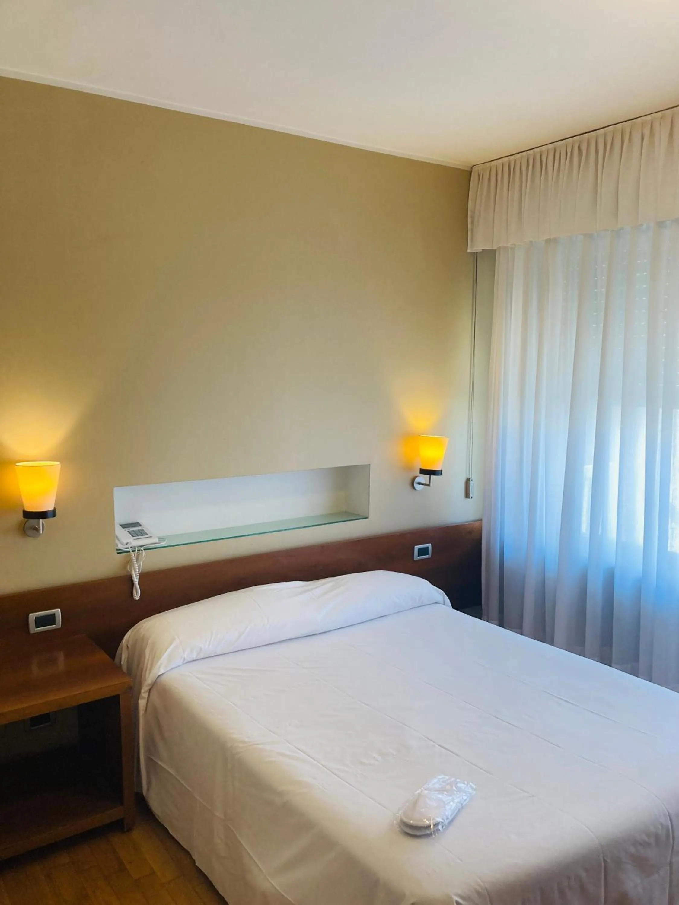 Bed in Hotel Ghironi