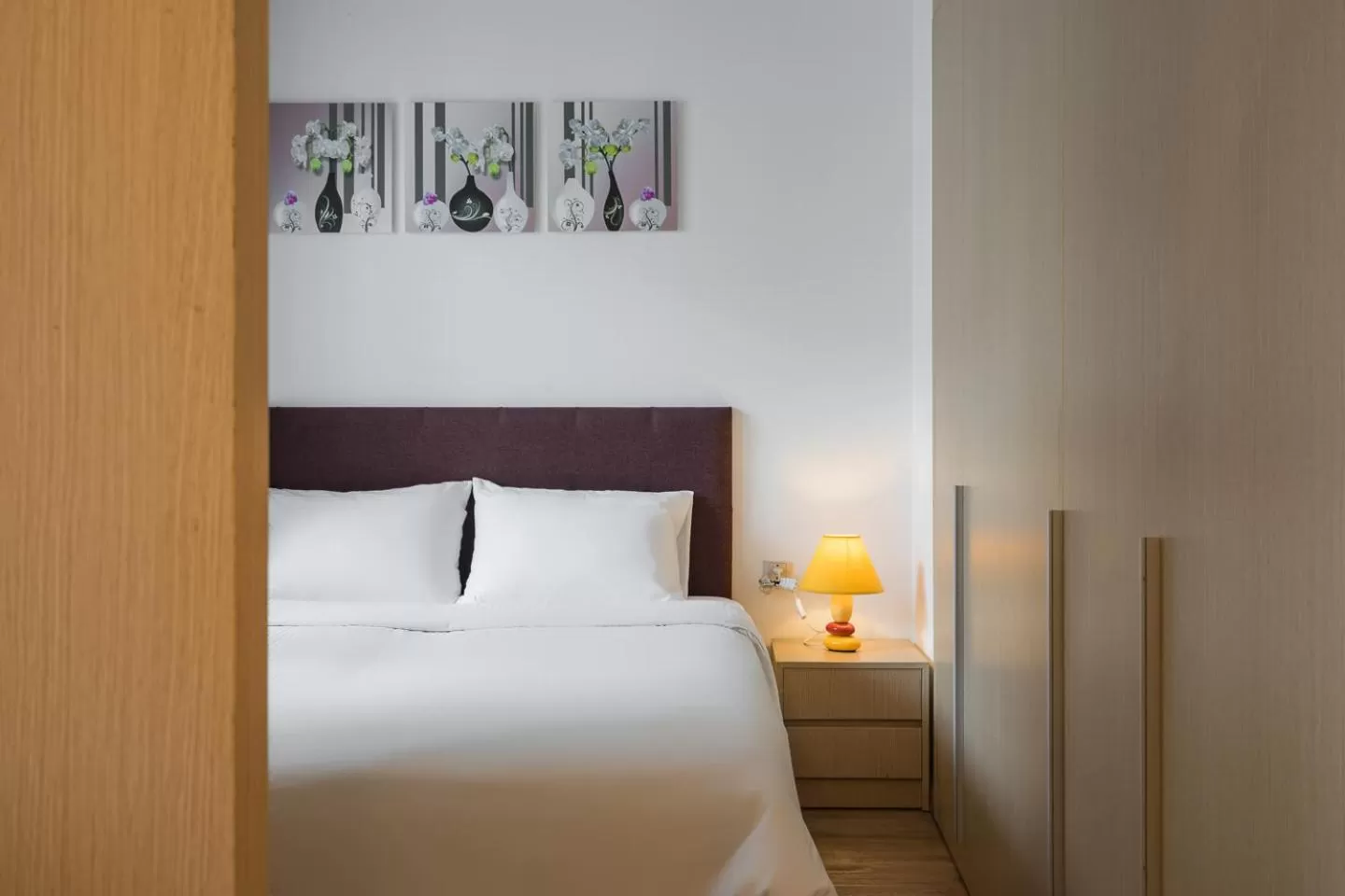 Bed in HNC Premier Hotel & Residences