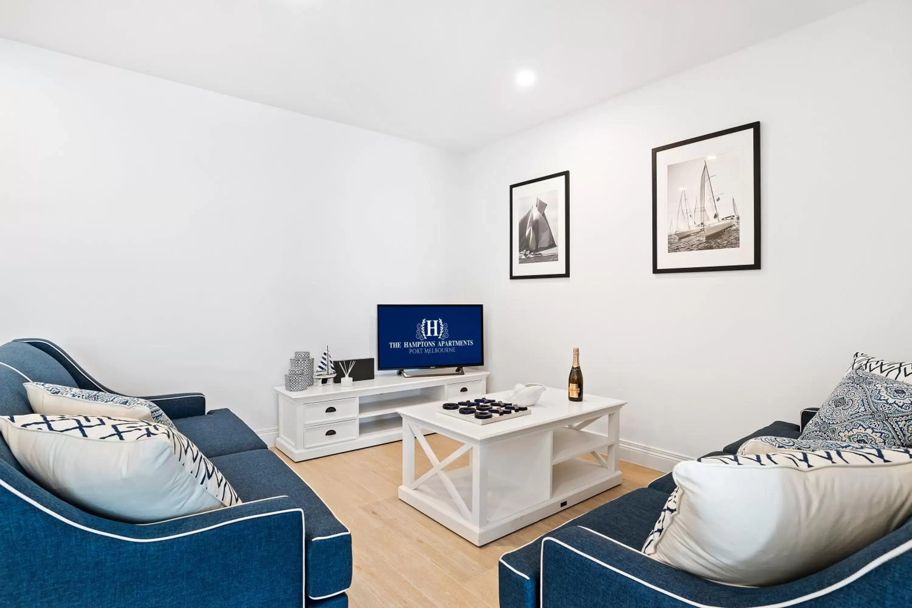 Living room, TV/Entertainment Center in The Hamptons Apartments - Port Melbourne