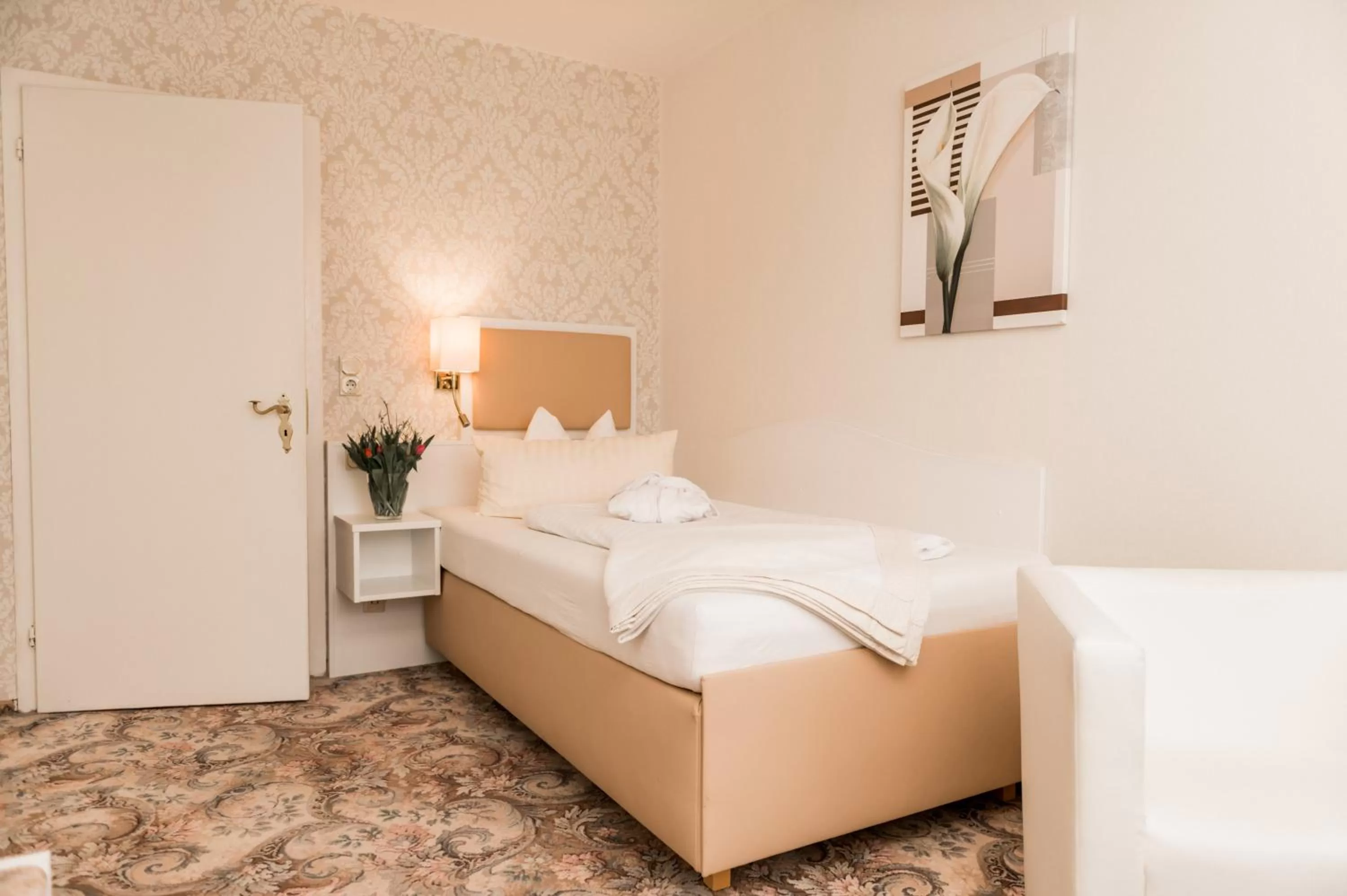 Bed in Parkhotel Weber-Müller