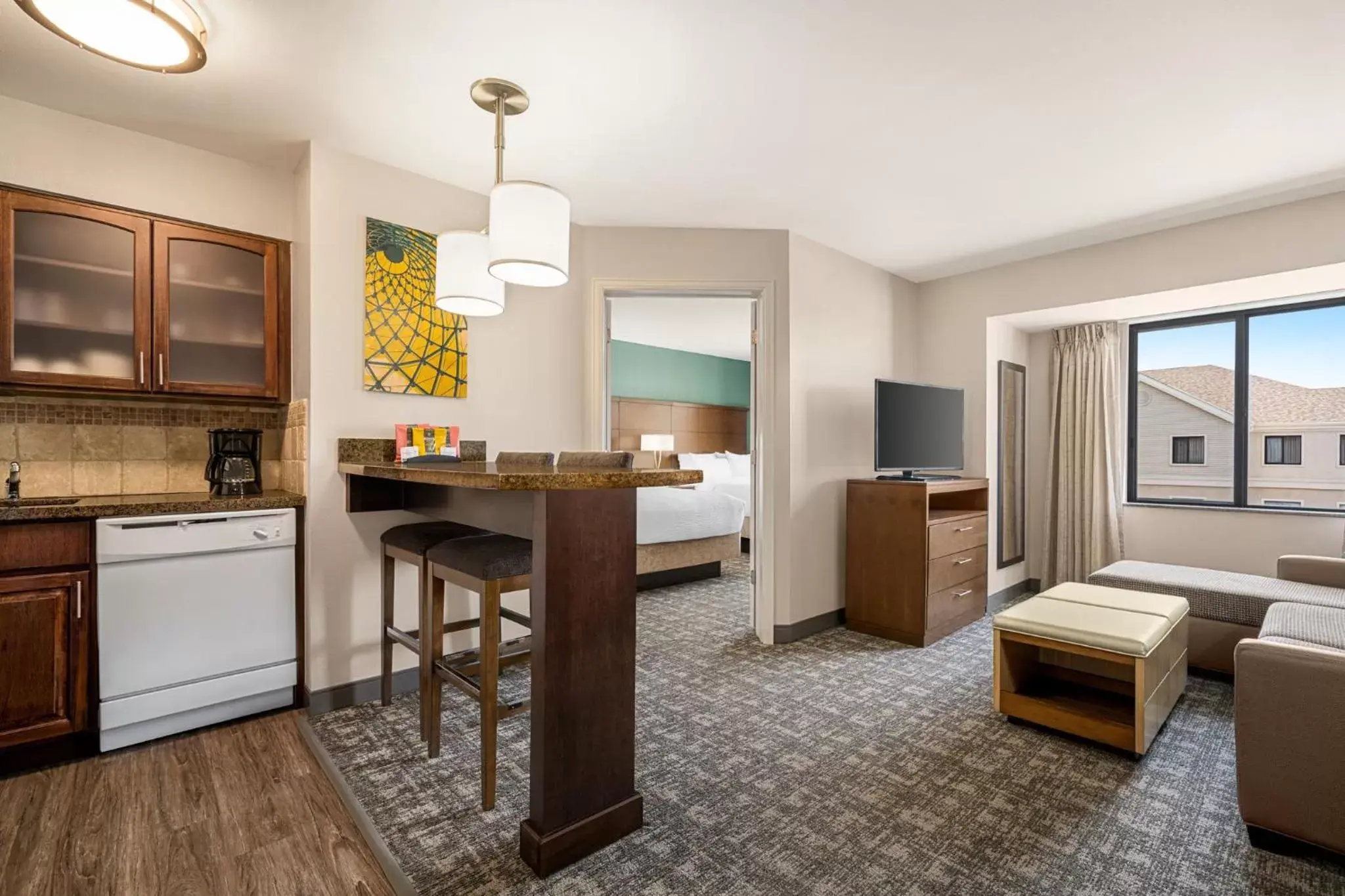 Photo of the whole room, Kitchen/Kitchenette in Staybridge Suites Oklahoma City-Quail Springs, an IHG Hotel