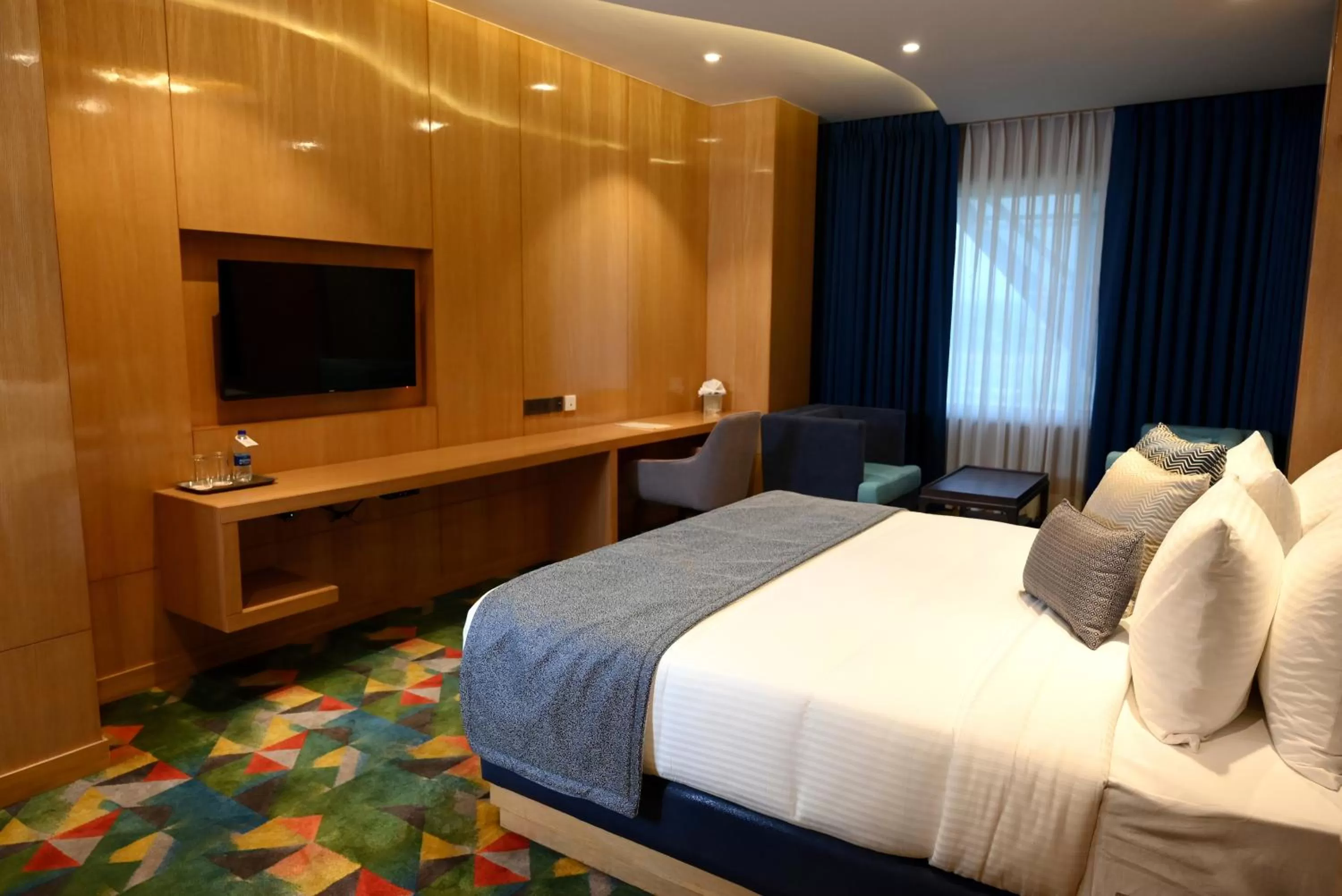 Photo of the whole room, Bed in Ramada Plaza by Wyndham Jammu Vijaypur