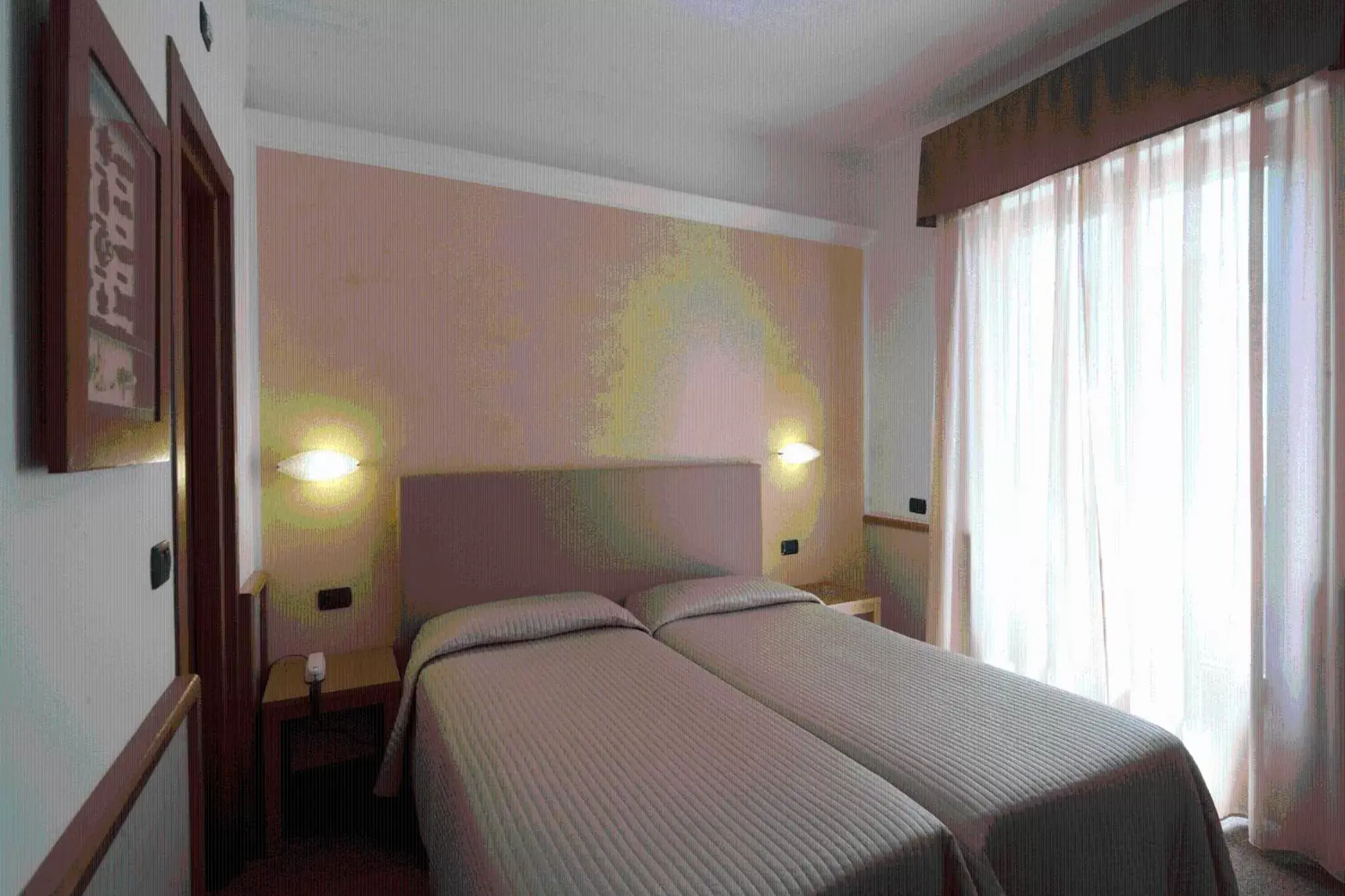 Bed in Hotel Florida Lerici